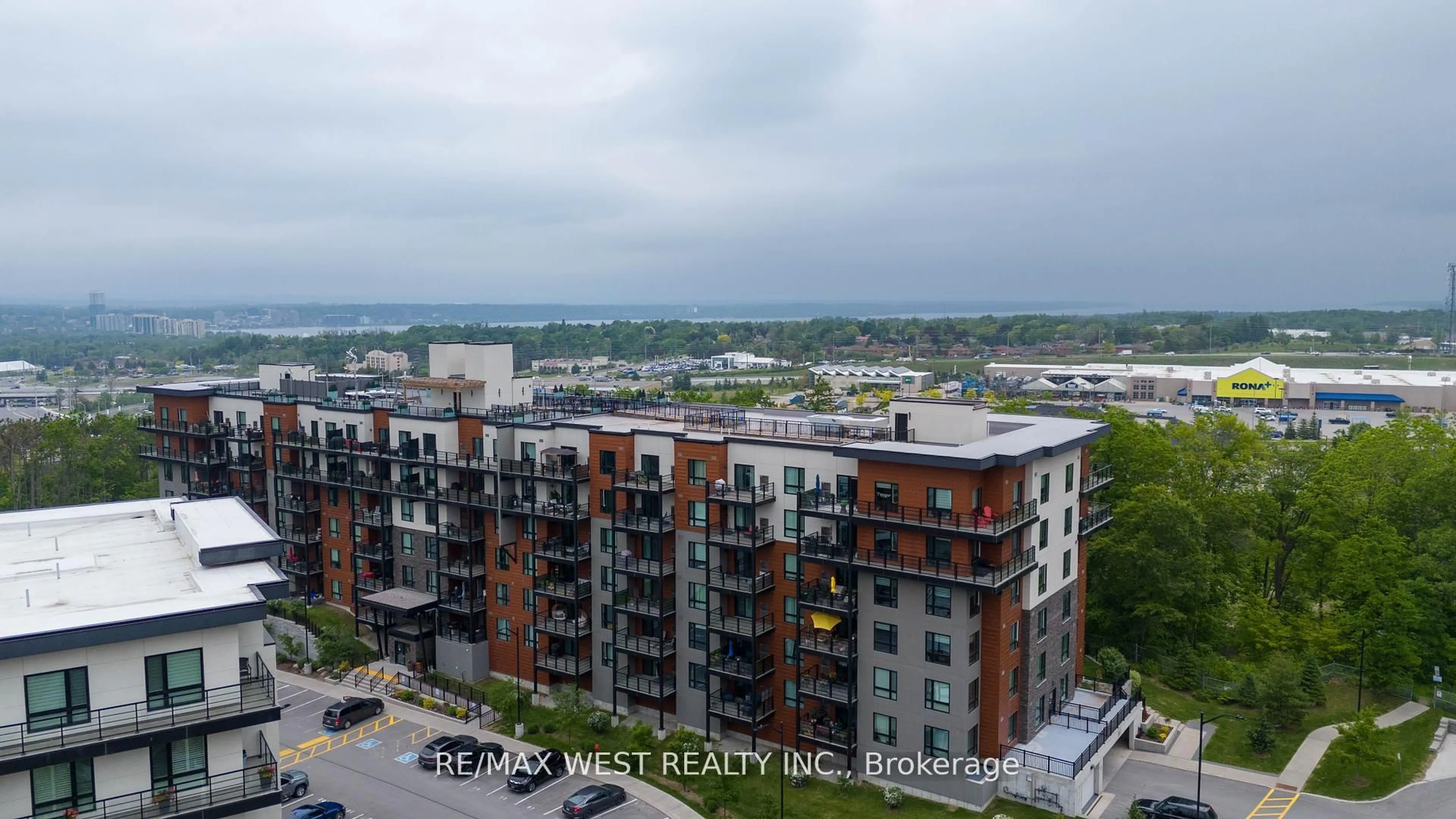 A pic from outside/outdoor area/front of a property/back of a property/a pic from drone, city buildings view from balcony for 302 ESSA Rd #309, Barrie Ontario L9J 0H3