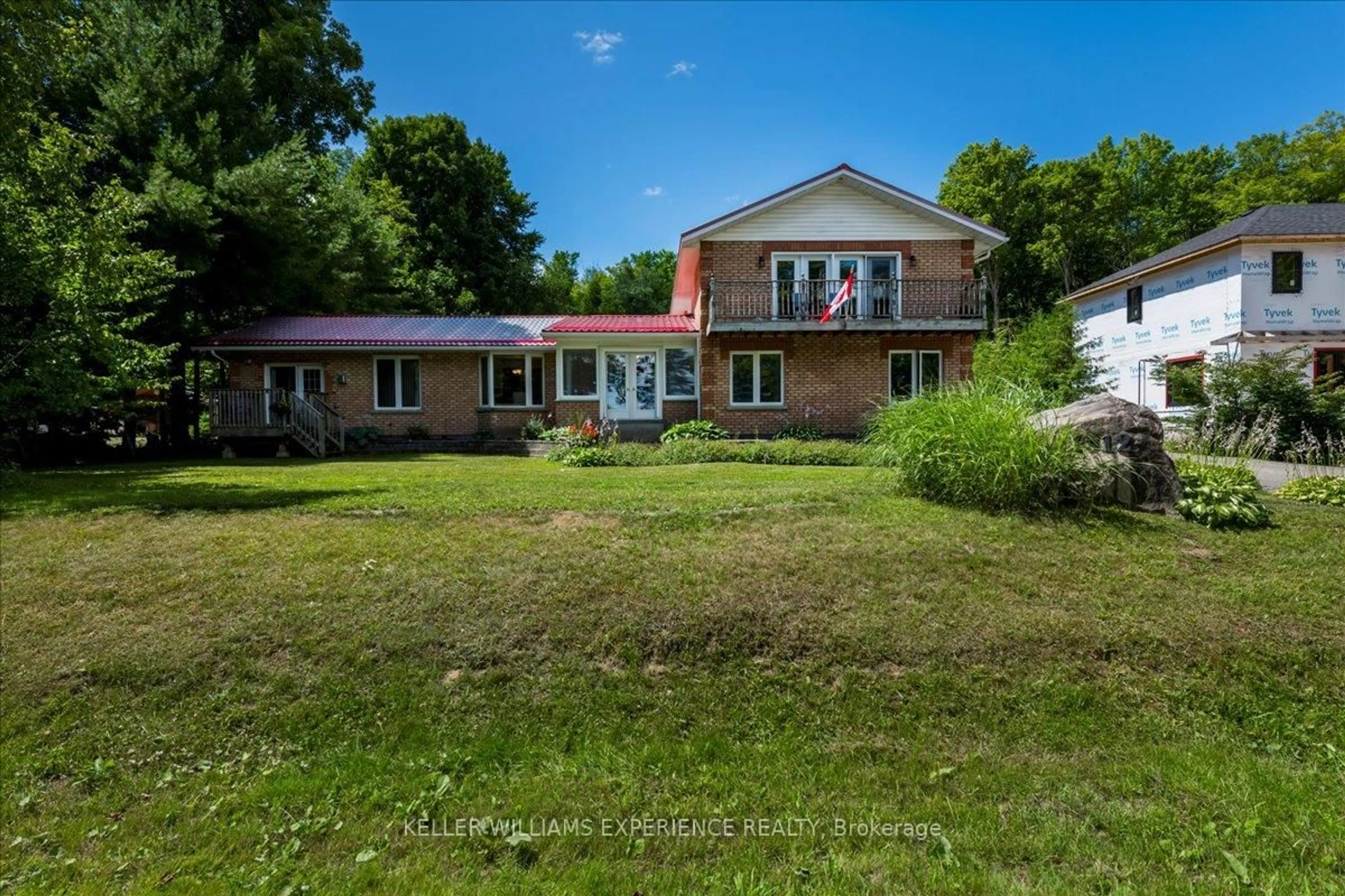 A pic from outside/outdoor area/front of a property/back of a property/a pic from drone, water/lake/river/ocean view for 1512 Champlain Rd, Tiny Ontario L9M 0C1
