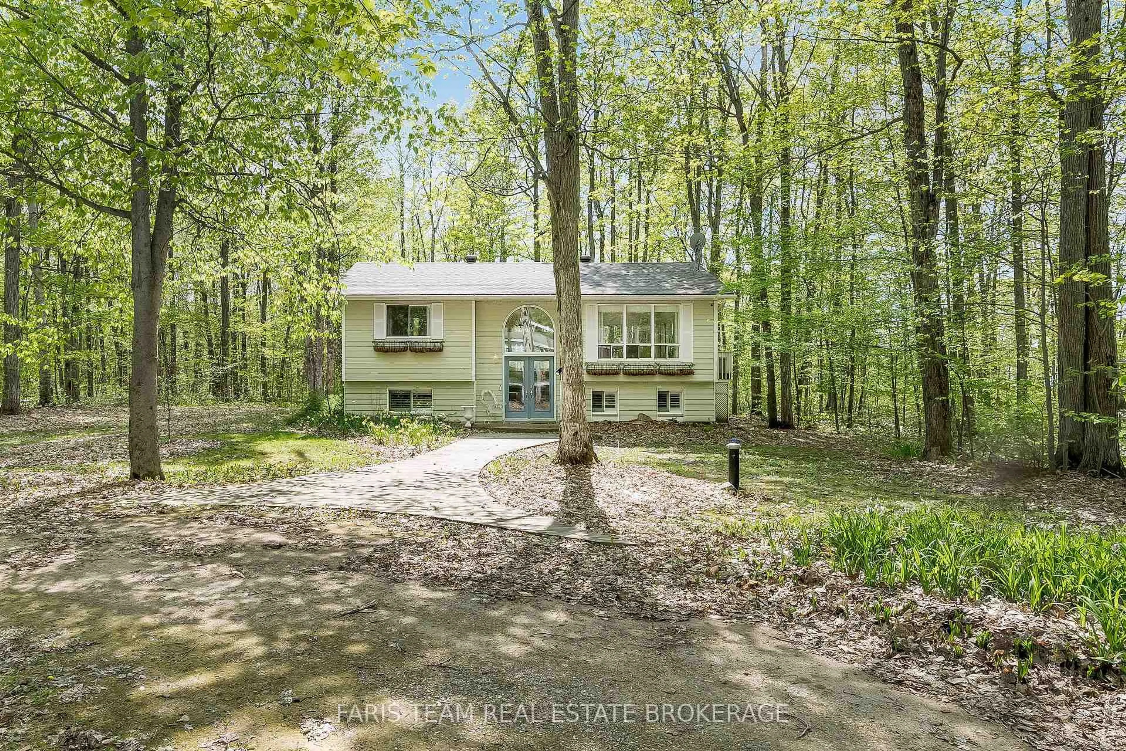 A pic from outside/outdoor area/front of a property/back of a property/a pic from drone, forest/trees view for 104 Silver Birch Dr, Tiny Ontario L9M 0M6