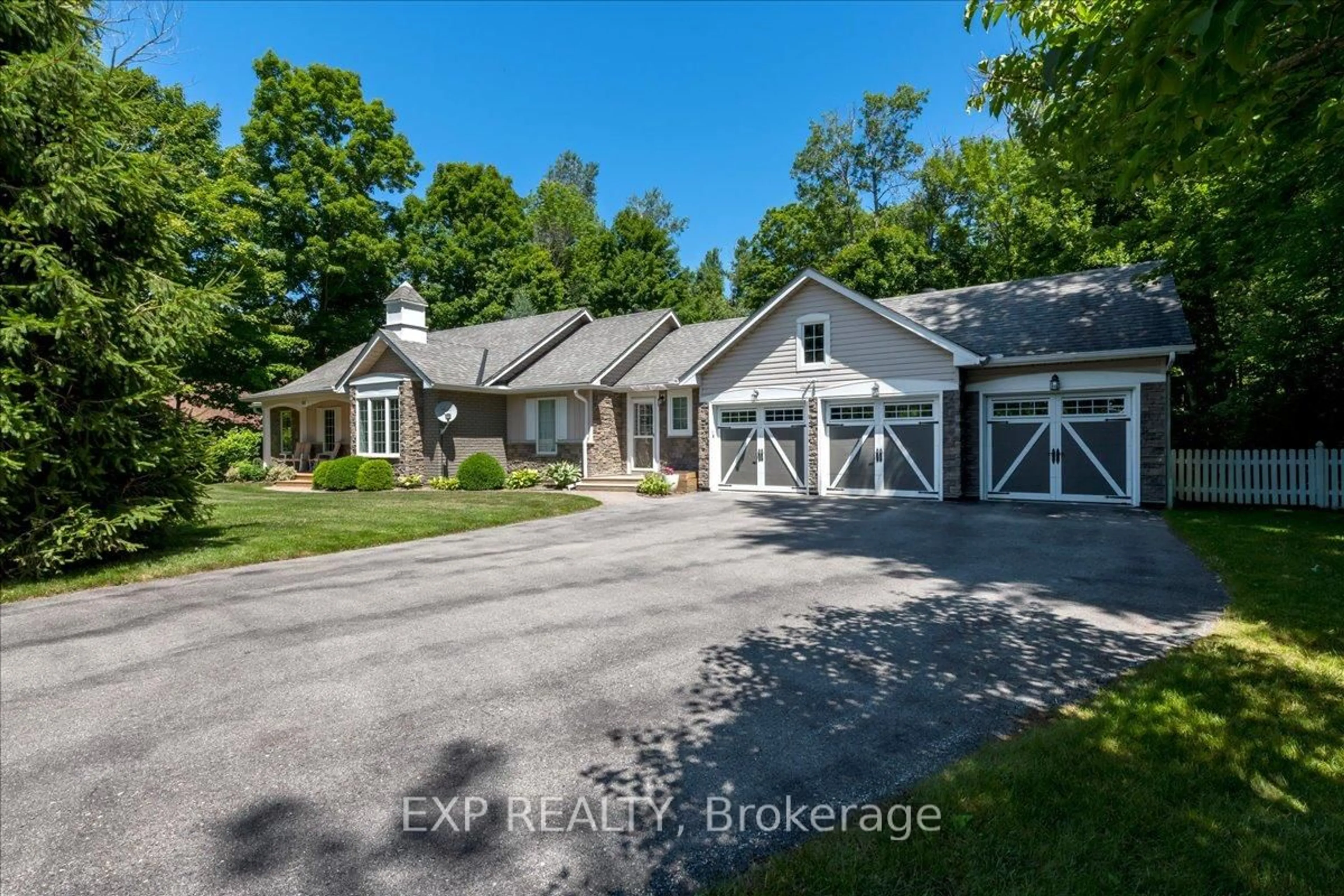 A pic from outside/outdoor area/front of a property/back of a property/a pic from drone, street for 220 Gilwood Park Dr, Penetanguishene Ontario L9M 1Z6