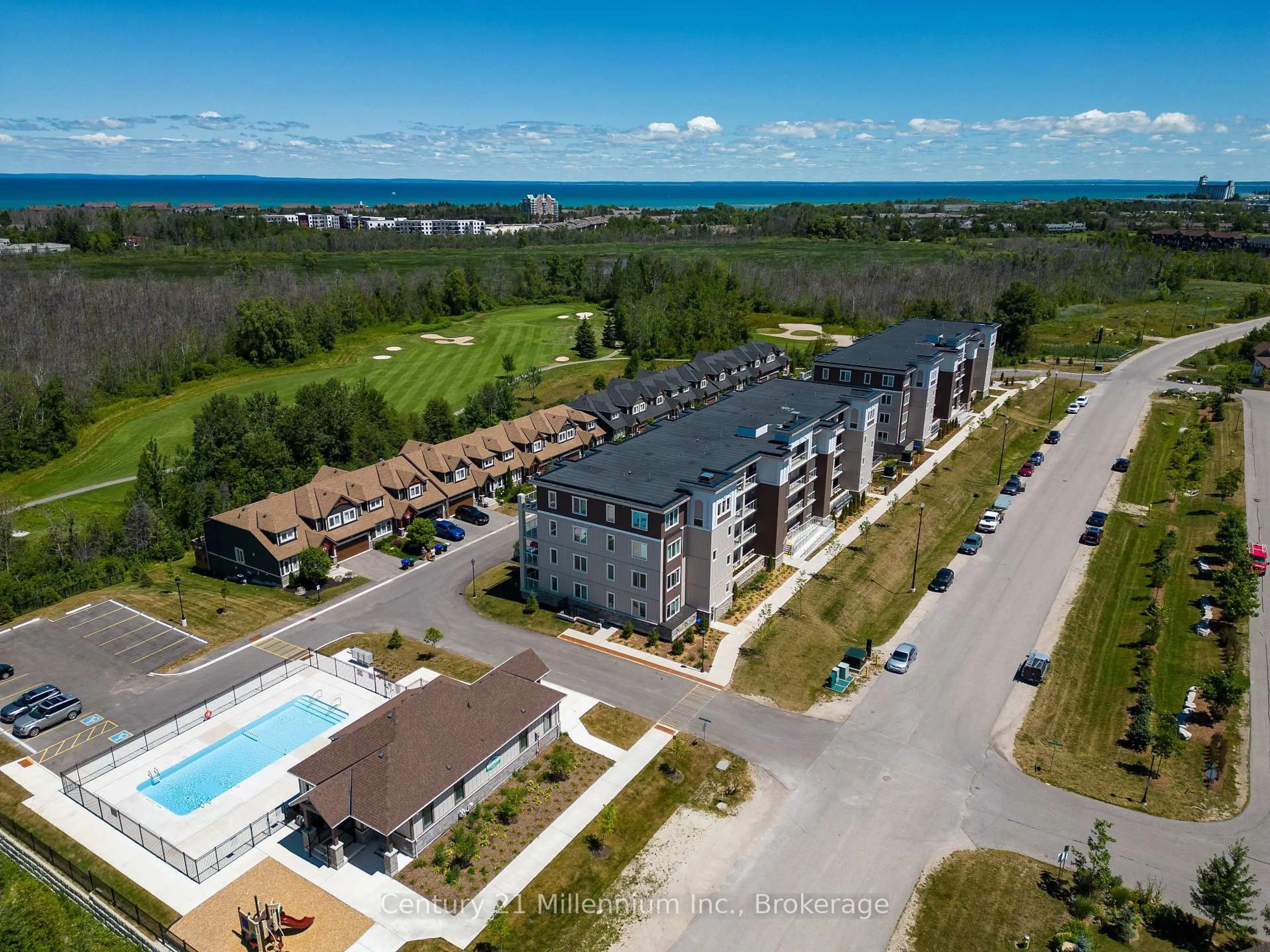 A pic from outside/outdoor area/front of a property/back of a property/a pic from drone, water/lake/river/ocean view for 17 Spooner Cres #205, Collingwood Ontario L9Y 1T3