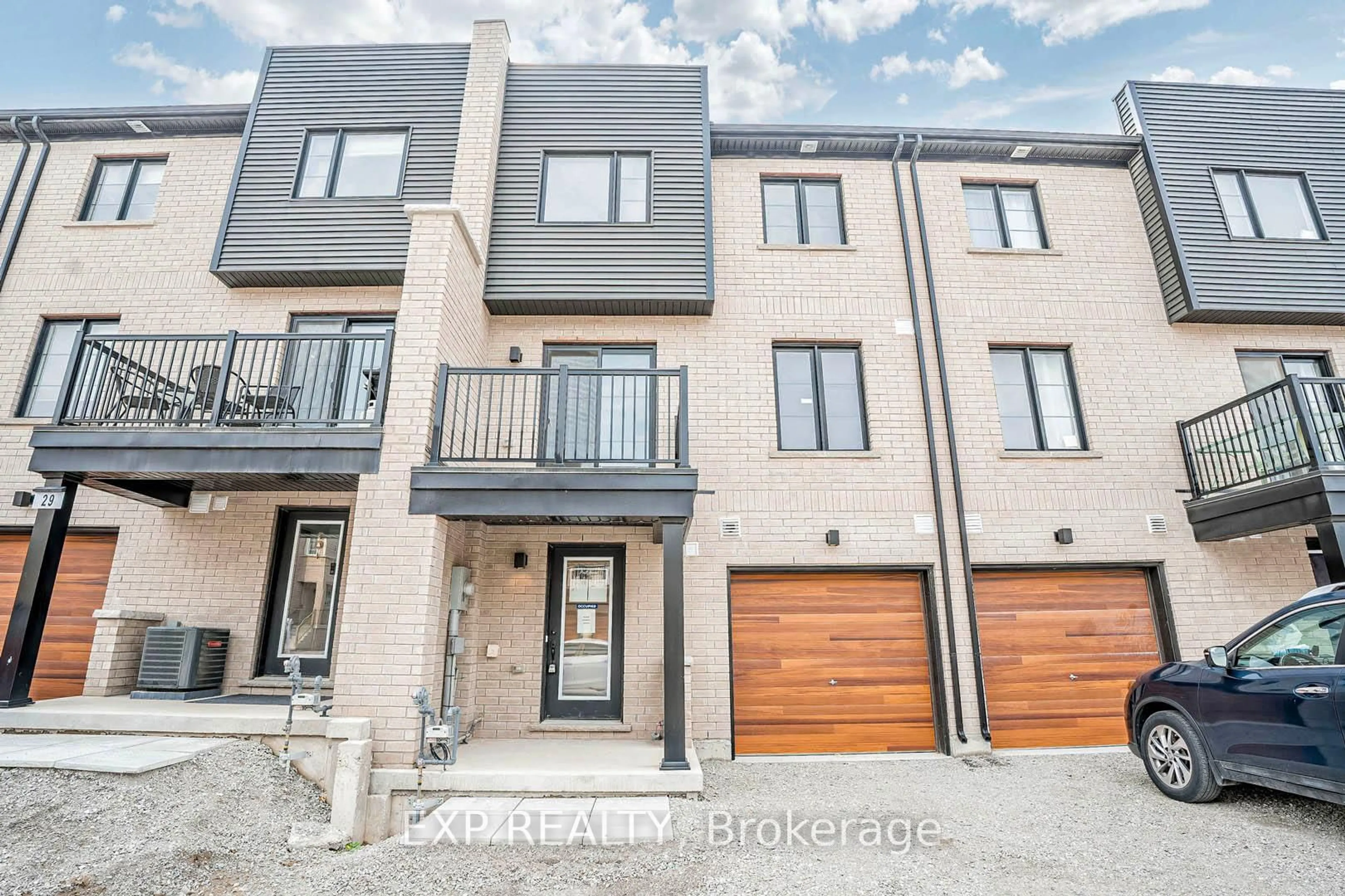 Home with brick exterior material, street for 31 Wagon Lane, Barrie Ontario L9J 0C2