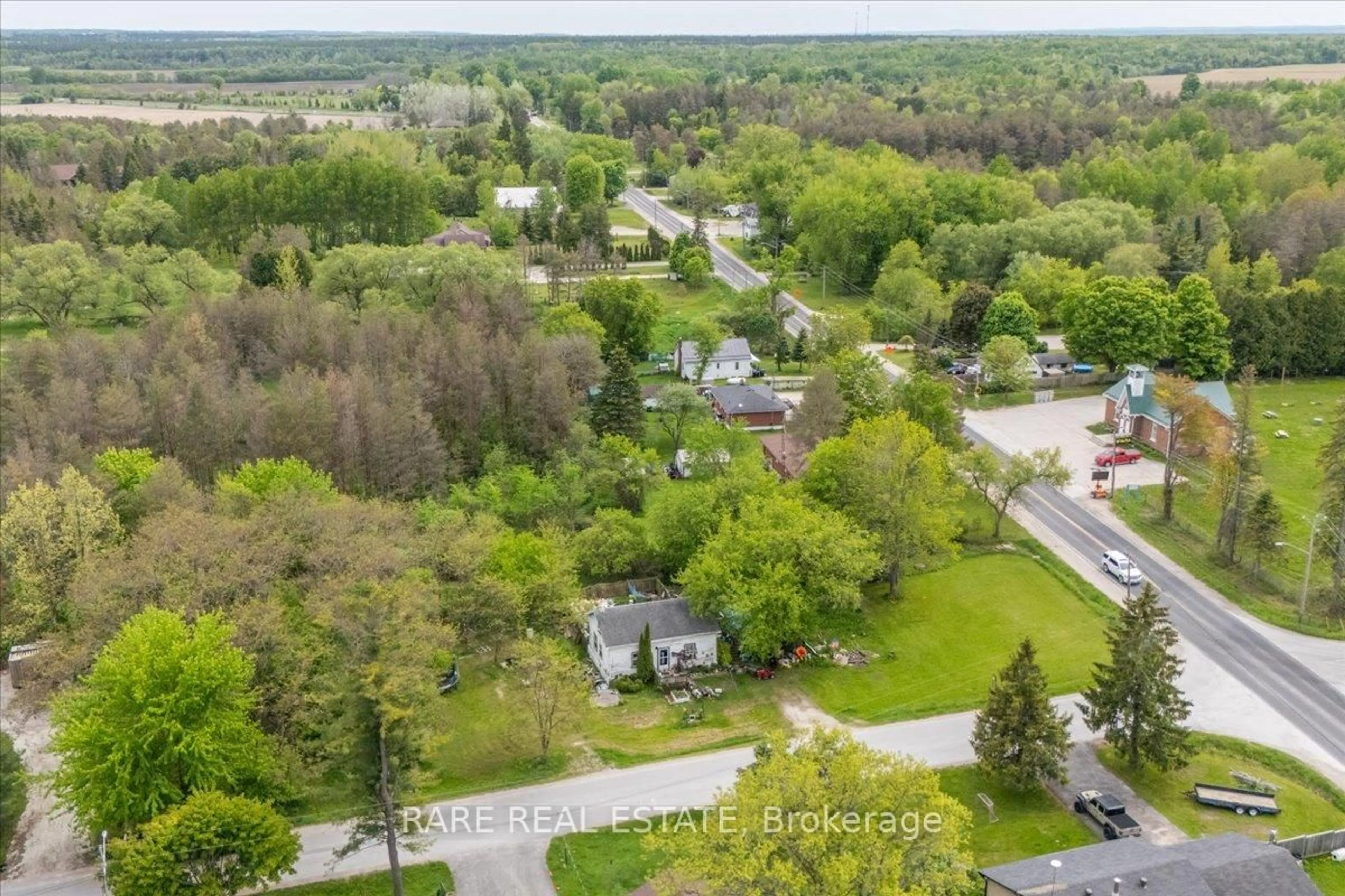 A pic from outside/outdoor area/front of a property/back of a property/a pic from drone, forest/trees view for 4879 SUNNIDALE CON. 2 Rd, Clearview Ontario L0M 1N0