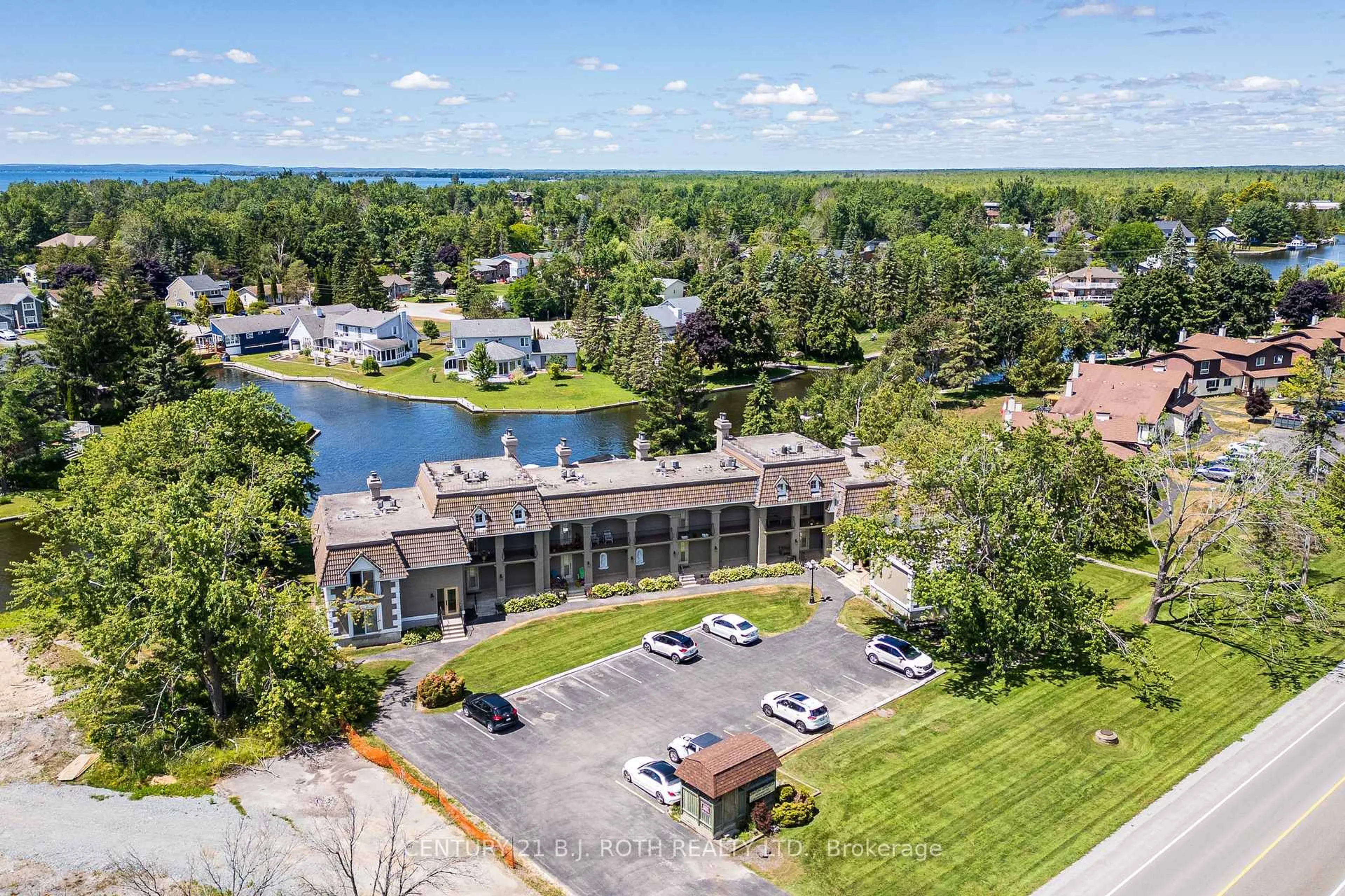 A pic from outside/outdoor area/front of a property/back of a property/a pic from drone, water/lake/river/ocean view for 60 Laguna Pkwy #16, Ramara Ontario L0K 1B0