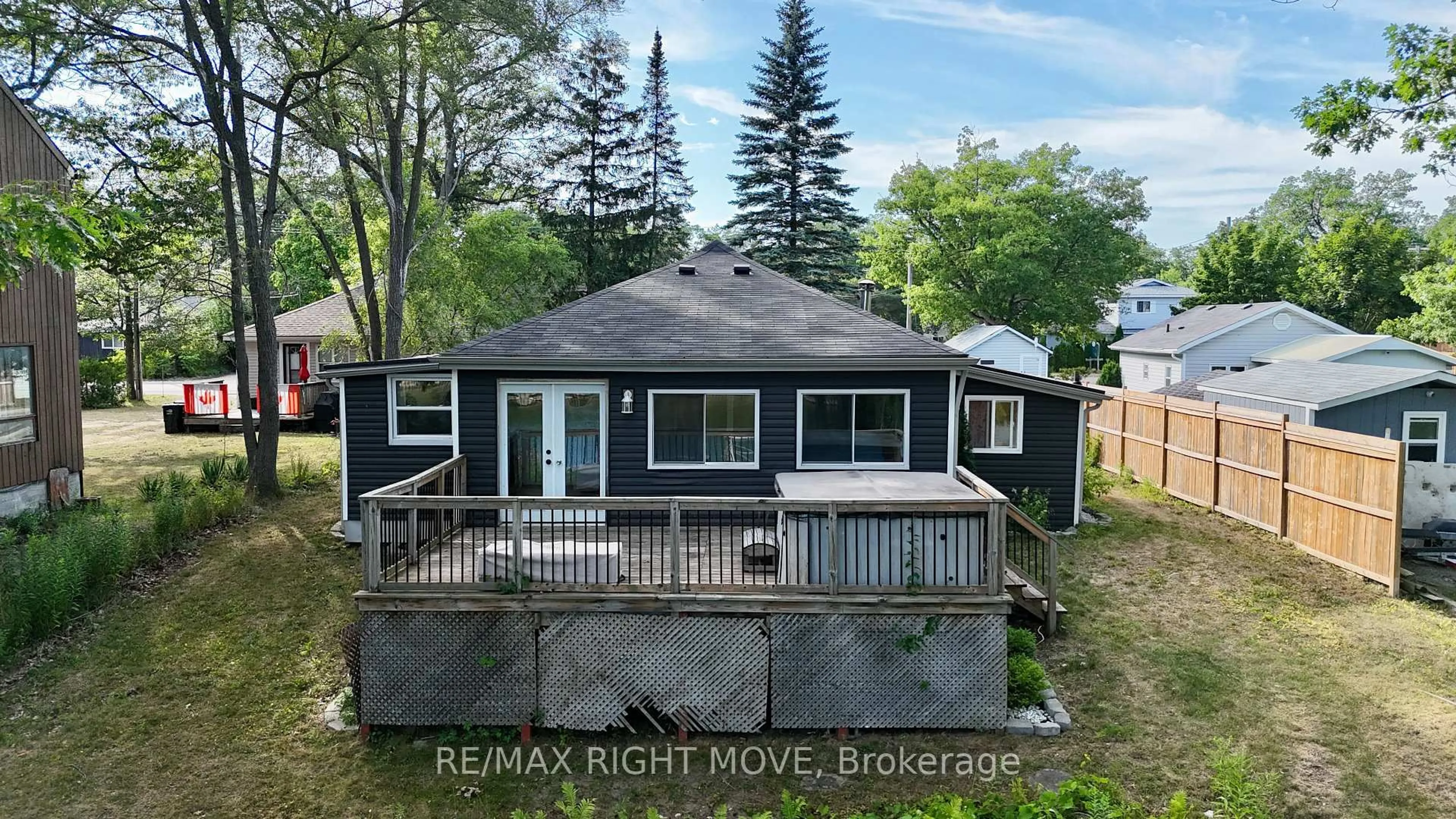 A pic from outside/outdoor area/front of a property/back of a property/a pic from drone, unknown for 993 Mosley St, Wasaga Beach Ontario L9Z 2G9