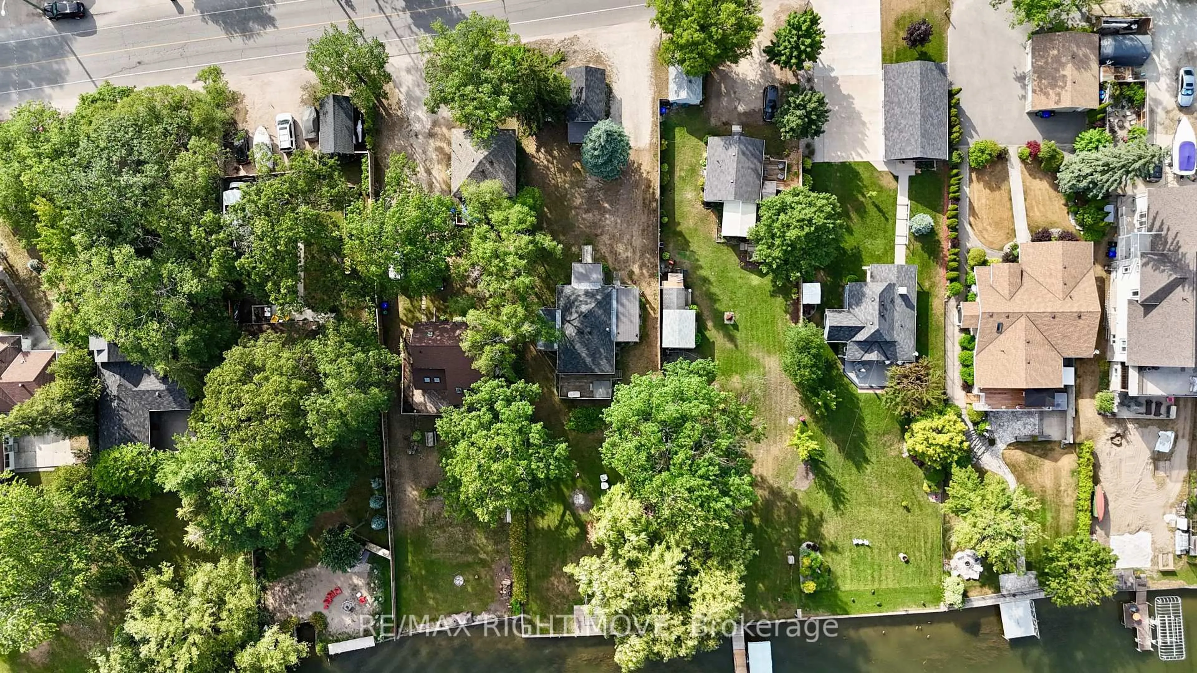 A pic from outside/outdoor area/front of a property/back of a property/a pic from drone, water/lake/river/ocean view for 993 Mosley St, Wasaga Beach Ontario L9Z 2G9