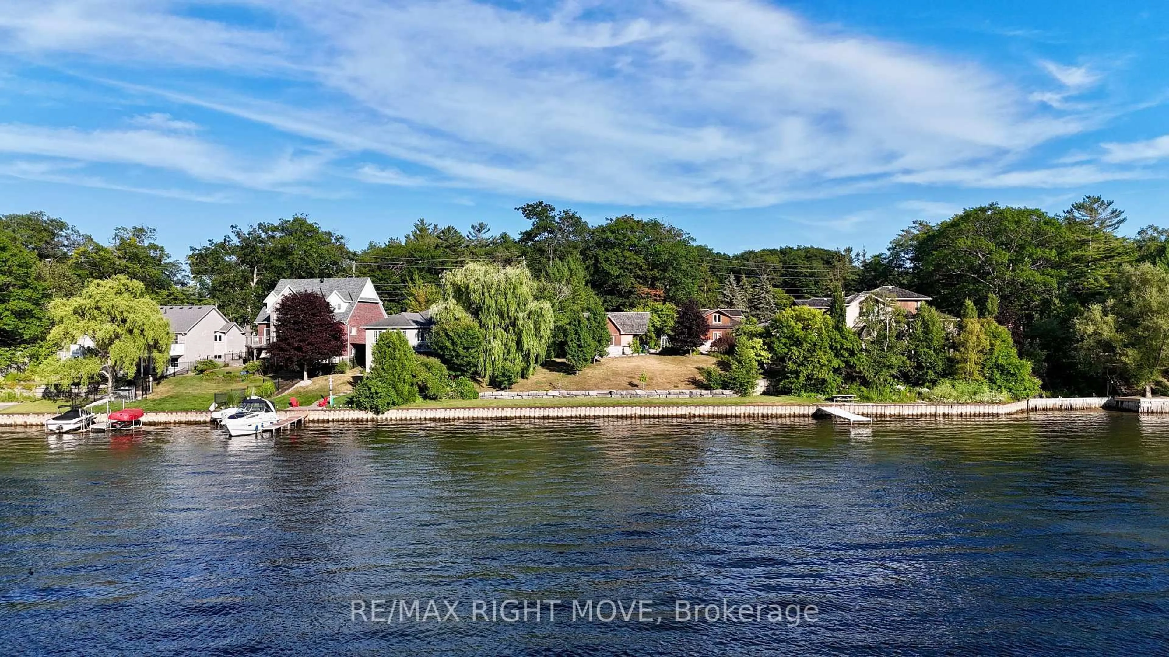 A pic from outside/outdoor area/front of a property/back of a property/a pic from drone, water/lake/river/ocean view for 993 Mosley St, Wasaga Beach Ontario L9Z 2G9