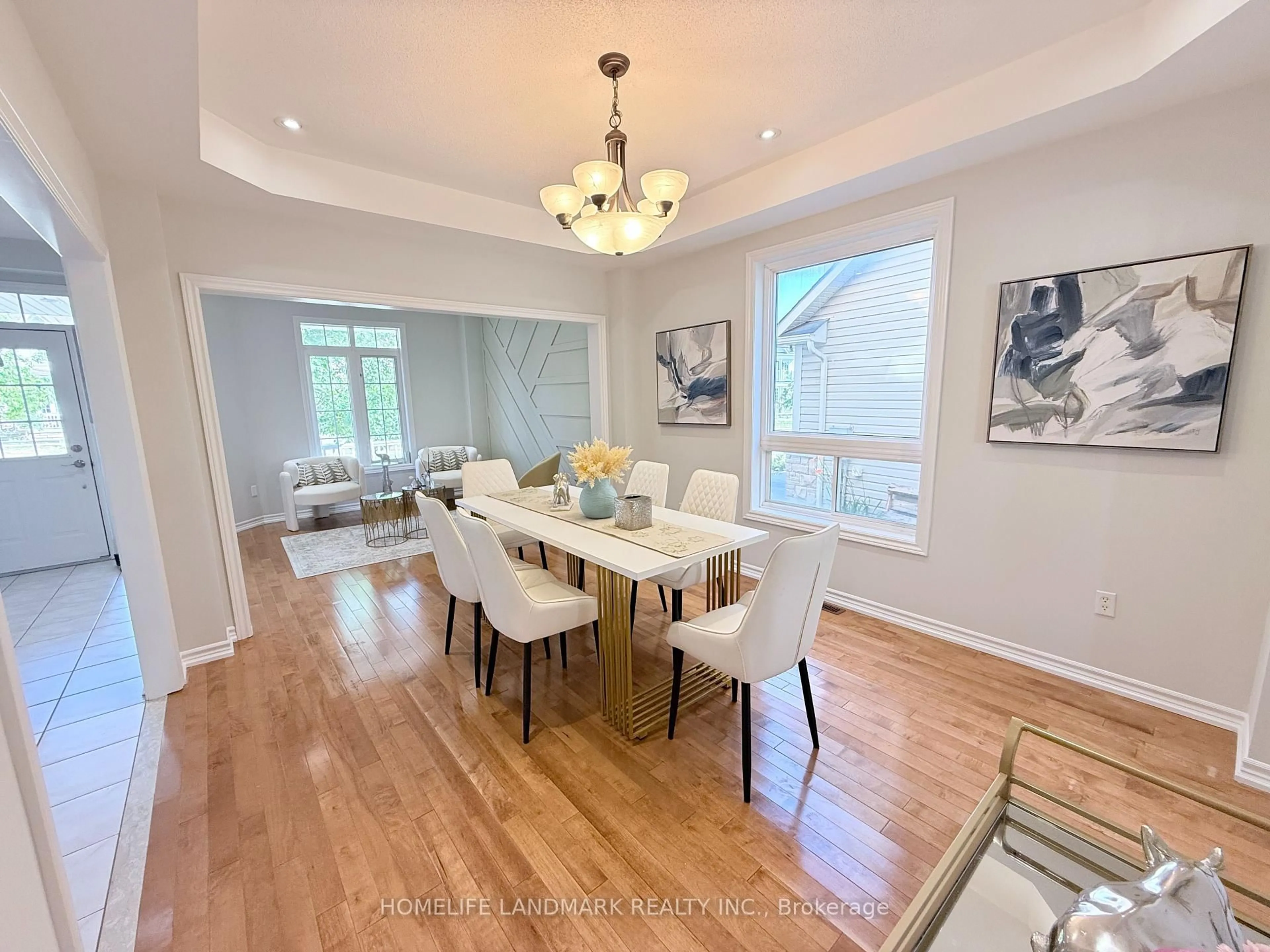 Dining room, wood/laminate floor for 18 The Queensway, Barrie Ontario L4M 7H6