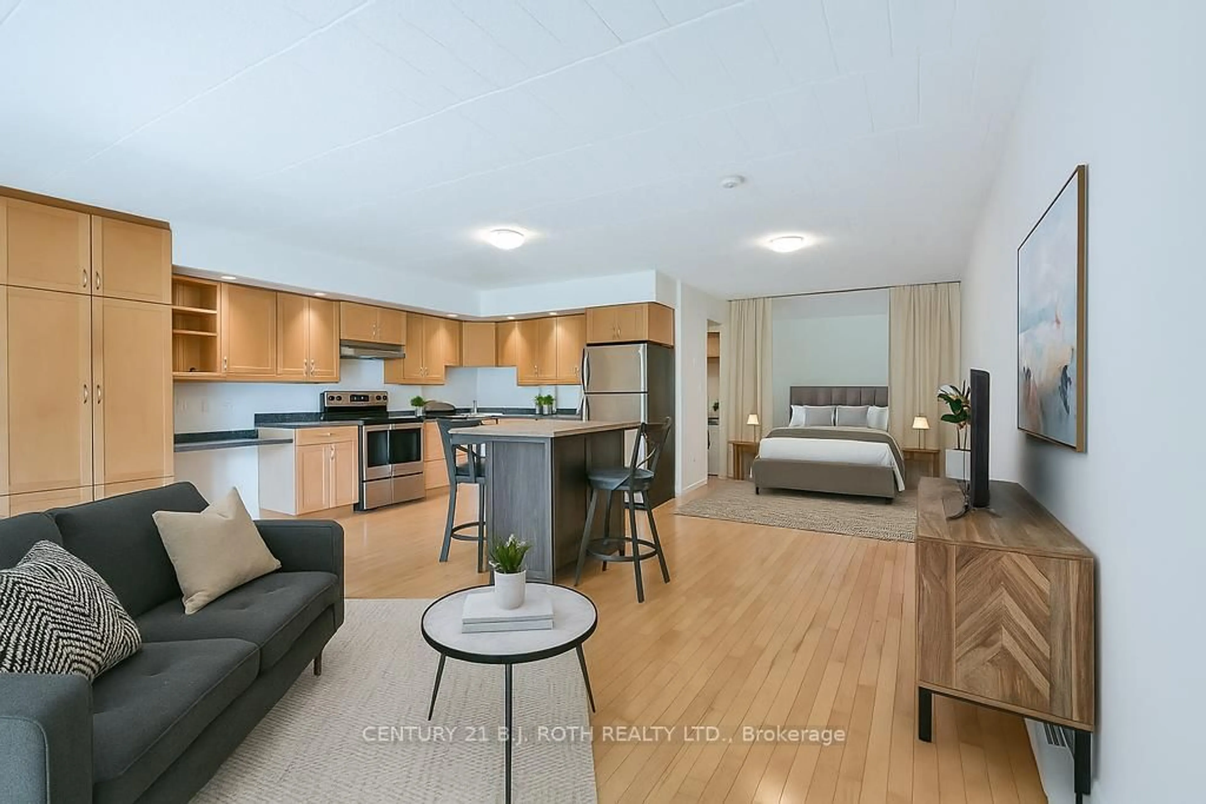 Open concept kitchen, wood/laminate floor for 1102 HORSESHOE VALLEY Rd #126, Oro-Medonte Ontario L4M 4Y8