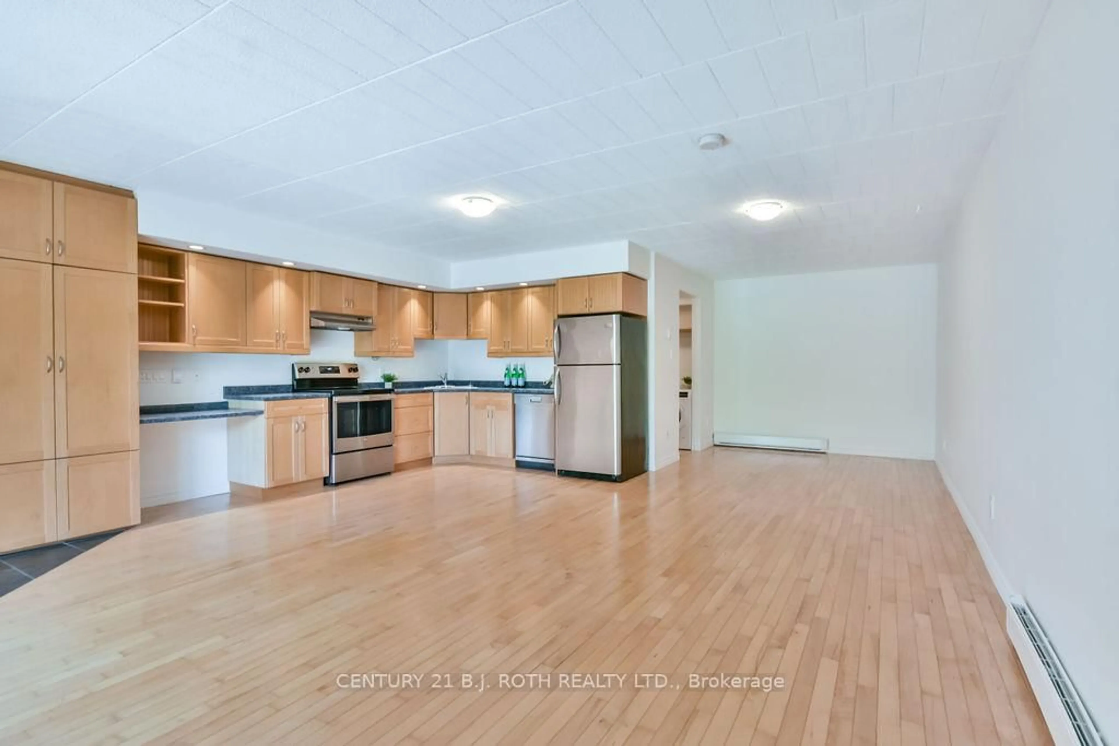 Open concept kitchen, unknown for 1102 HORSESHOE VALLEY Rd #126, Oro-Medonte Ontario L4M 4Y8