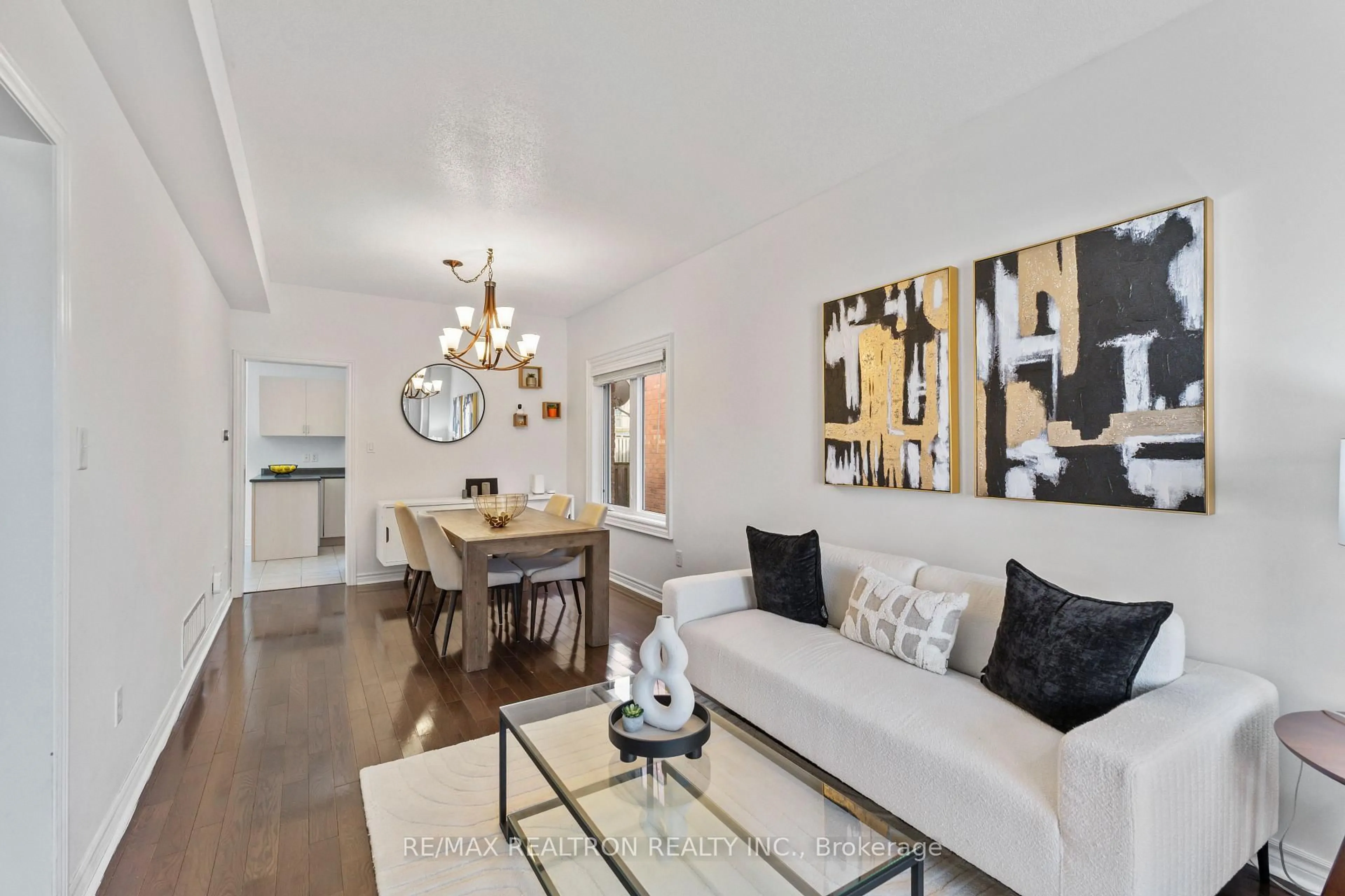 Living room with furniture, wood/laminate floor for 11 Jessica Dr, Barrie Ontario L4N 5S7