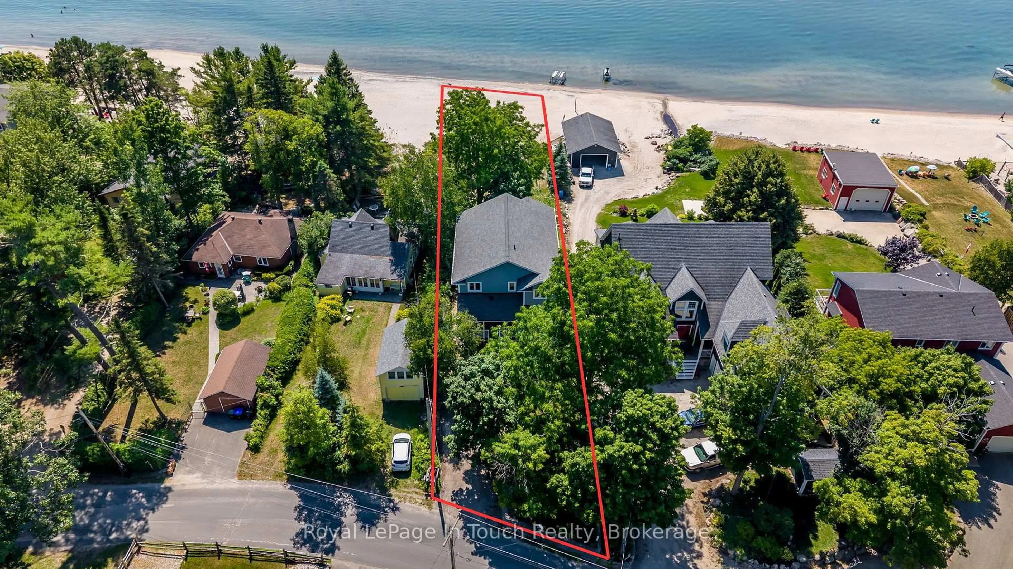 A pic from outside/outdoor area/front of a property/back of a property/a pic from drone, water/lake/river/ocean view for 44 Tiny Beaches Rd, Tiny Ontario L0L 2J0