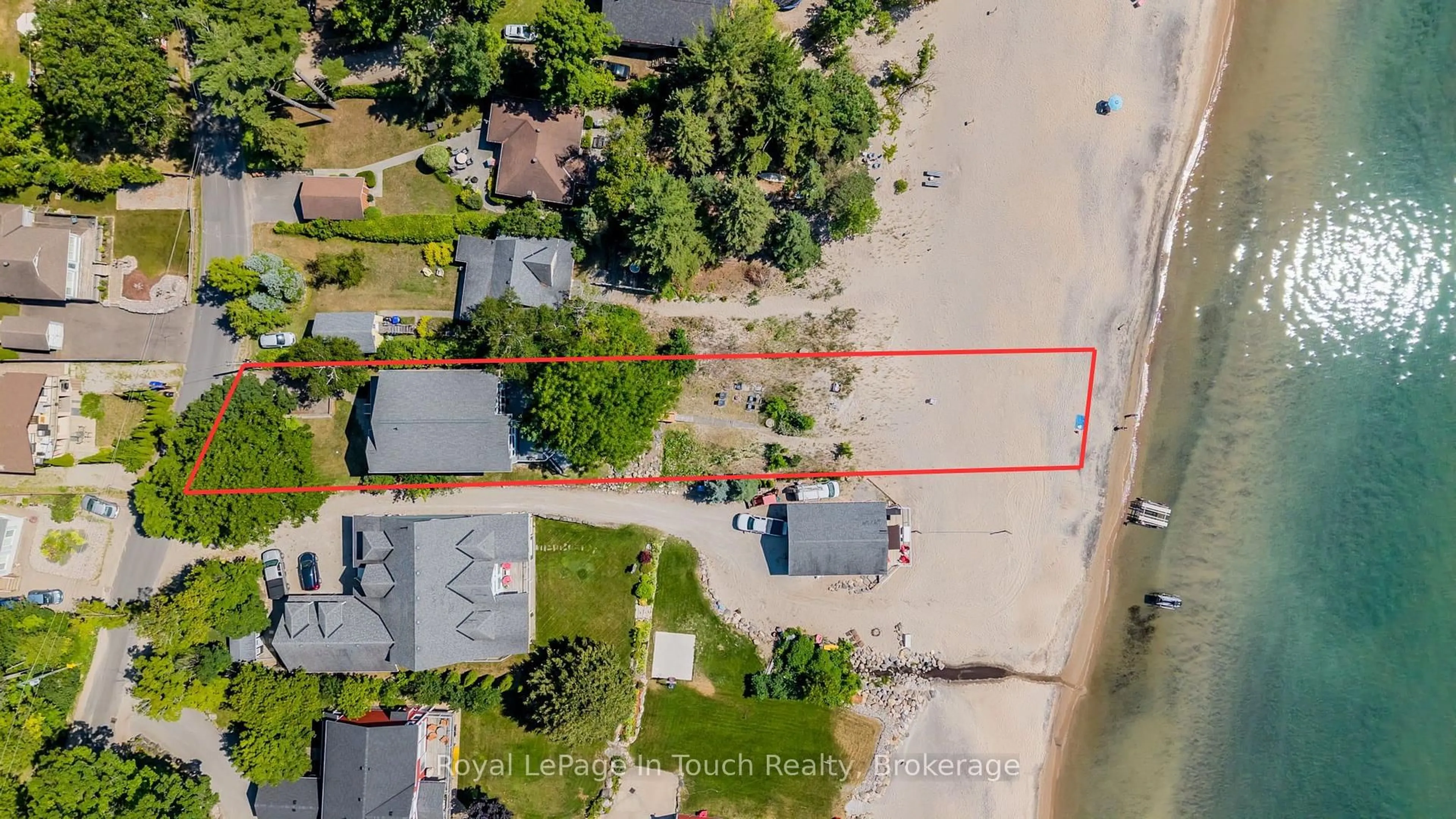 A pic from outside/outdoor area/front of a property/back of a property/a pic from drone, water/lake/river/ocean view for 44 Tiny Beaches Rd, Tiny Ontario L0L 2J0