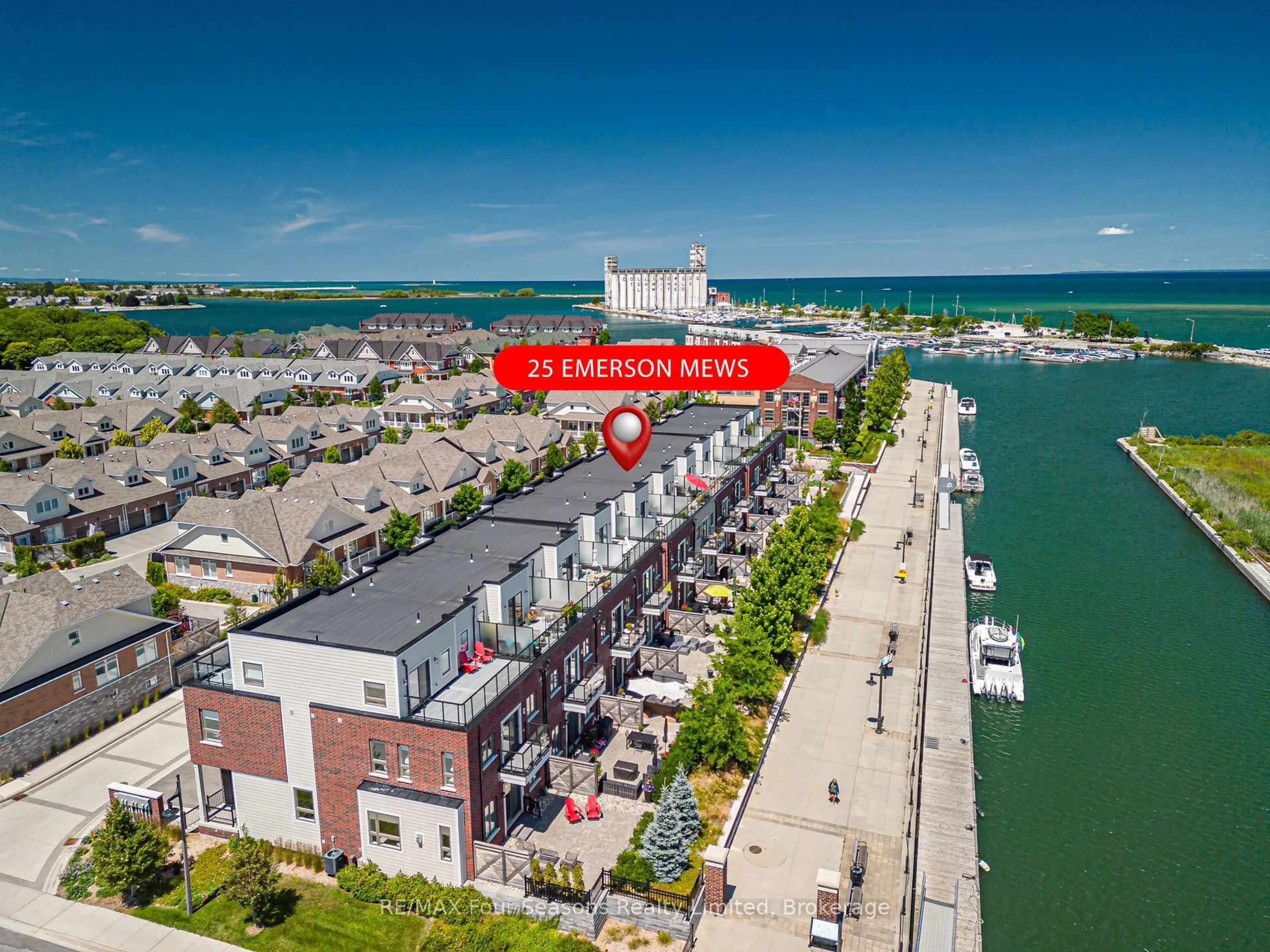 A pic from outside/outdoor area/front of a property/back of a property/a pic from drone, water/lake/river/ocean view for 25 Emerson Mews #6, Collingwood Ontario L9Y 2X4