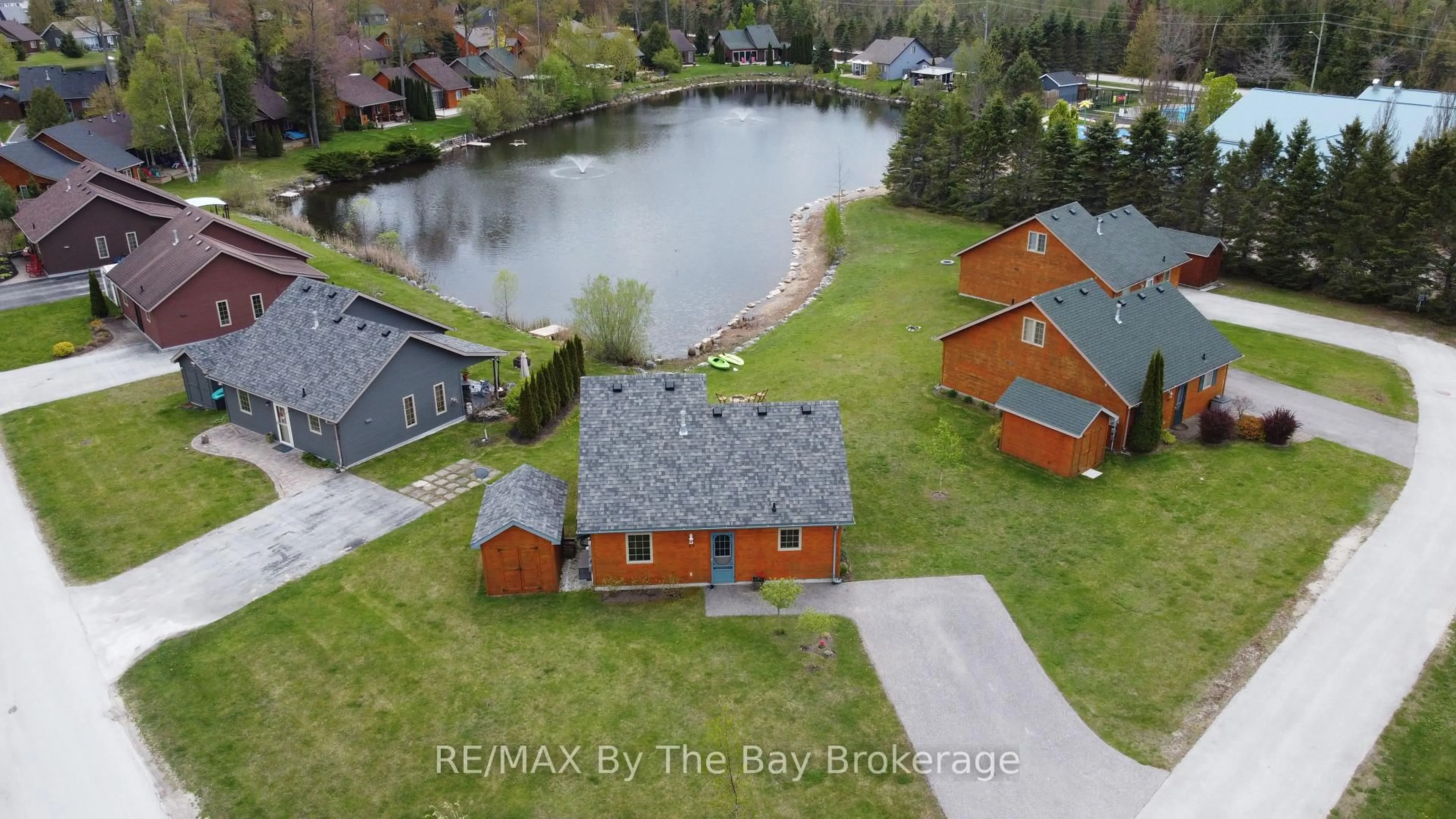 A pic from outside/outdoor area/front of a property/back of a property/a pic from drone, water/lake/river/ocean view for 49 Cabin Cres, Wasaga Beach Ontario L9Z 1X7