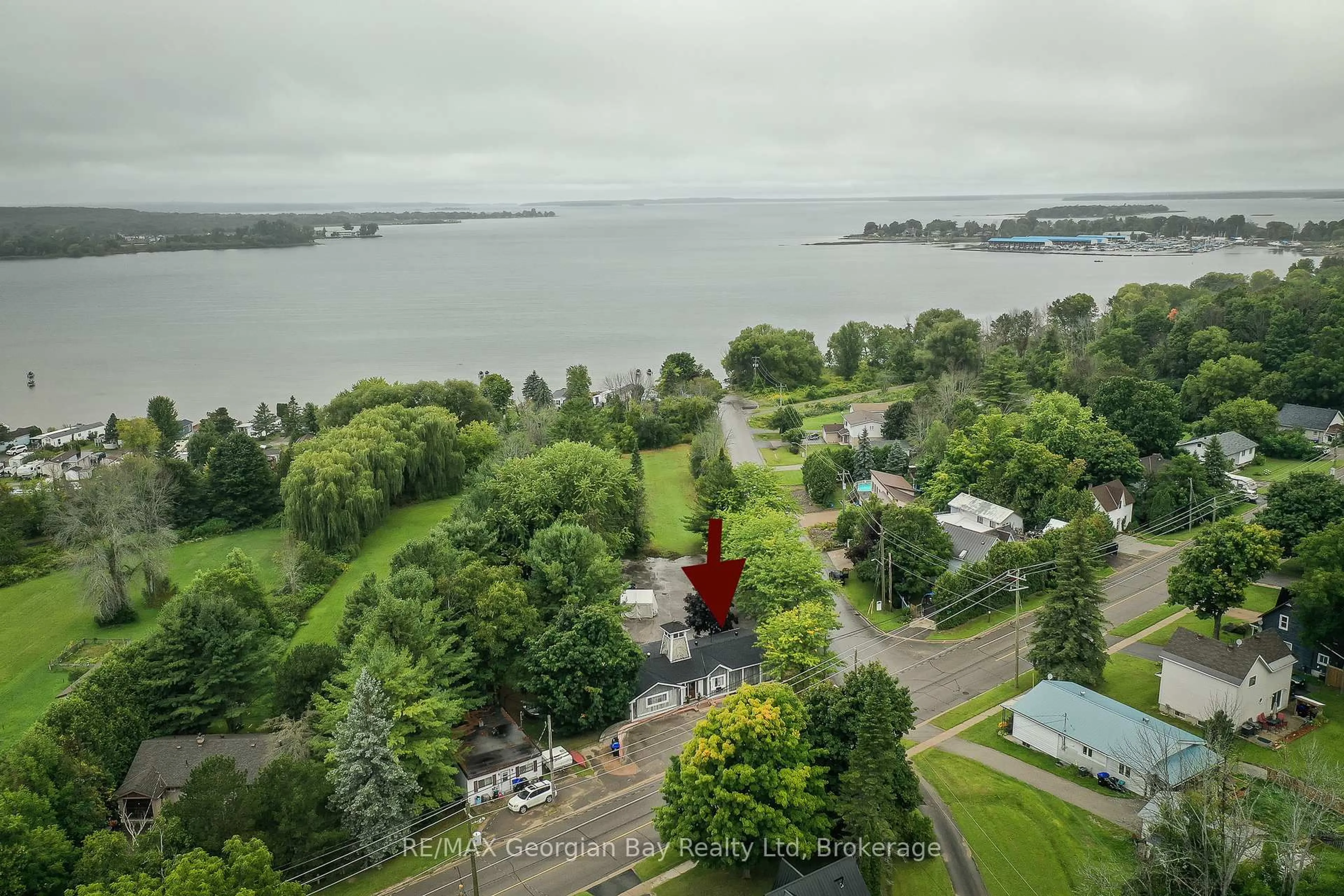 A pic from outside/outdoor area/front of a property/back of a property/a pic from drone, water/lake/river/ocean view for 392 WILLIAM St, Tay Ontario L0K 2A0