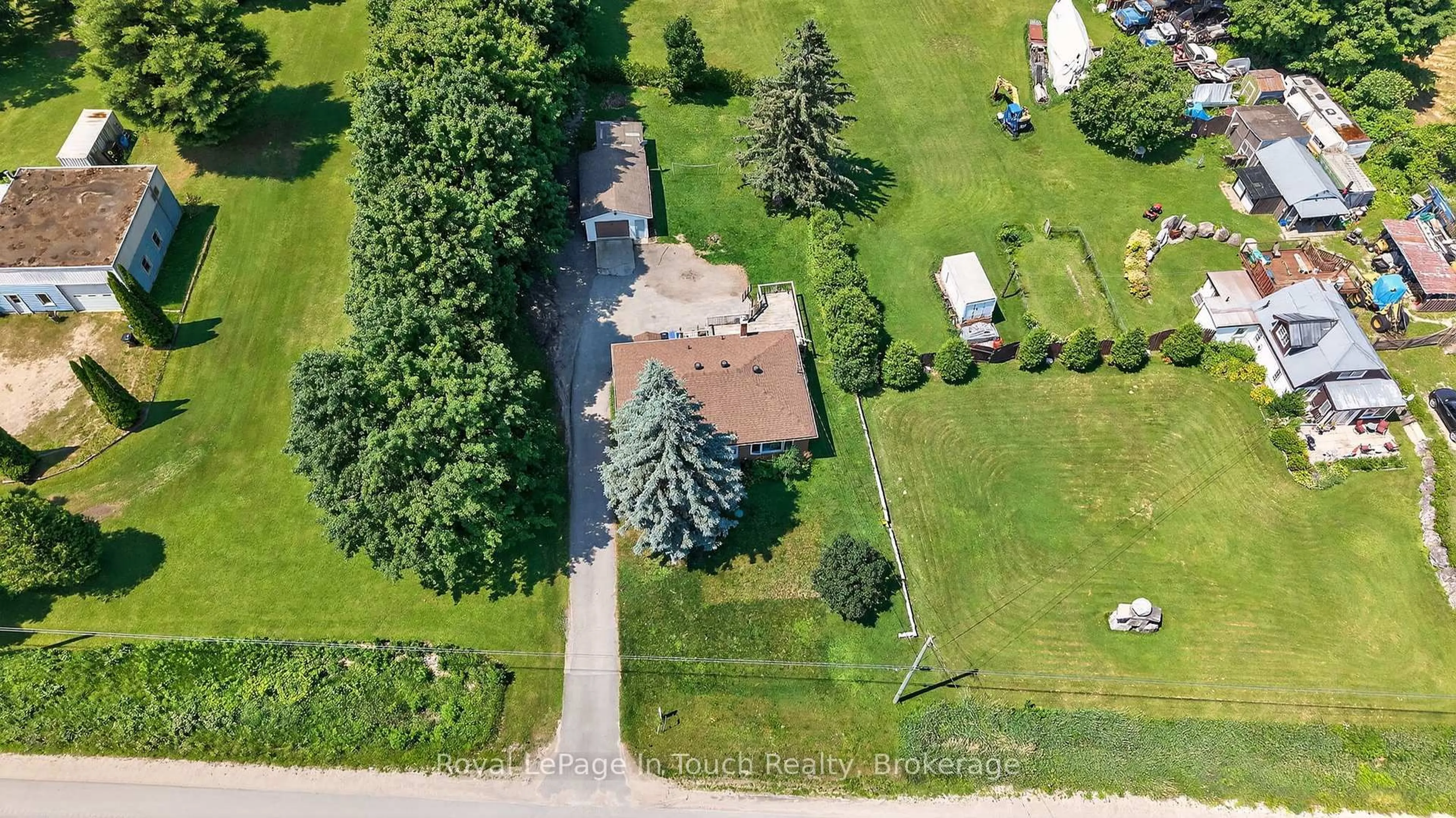 A pic from outside/outdoor area/front of a property/back of a property/a pic from drone, street for 8906 County Road 93, Midland Ontario L4R 4K4