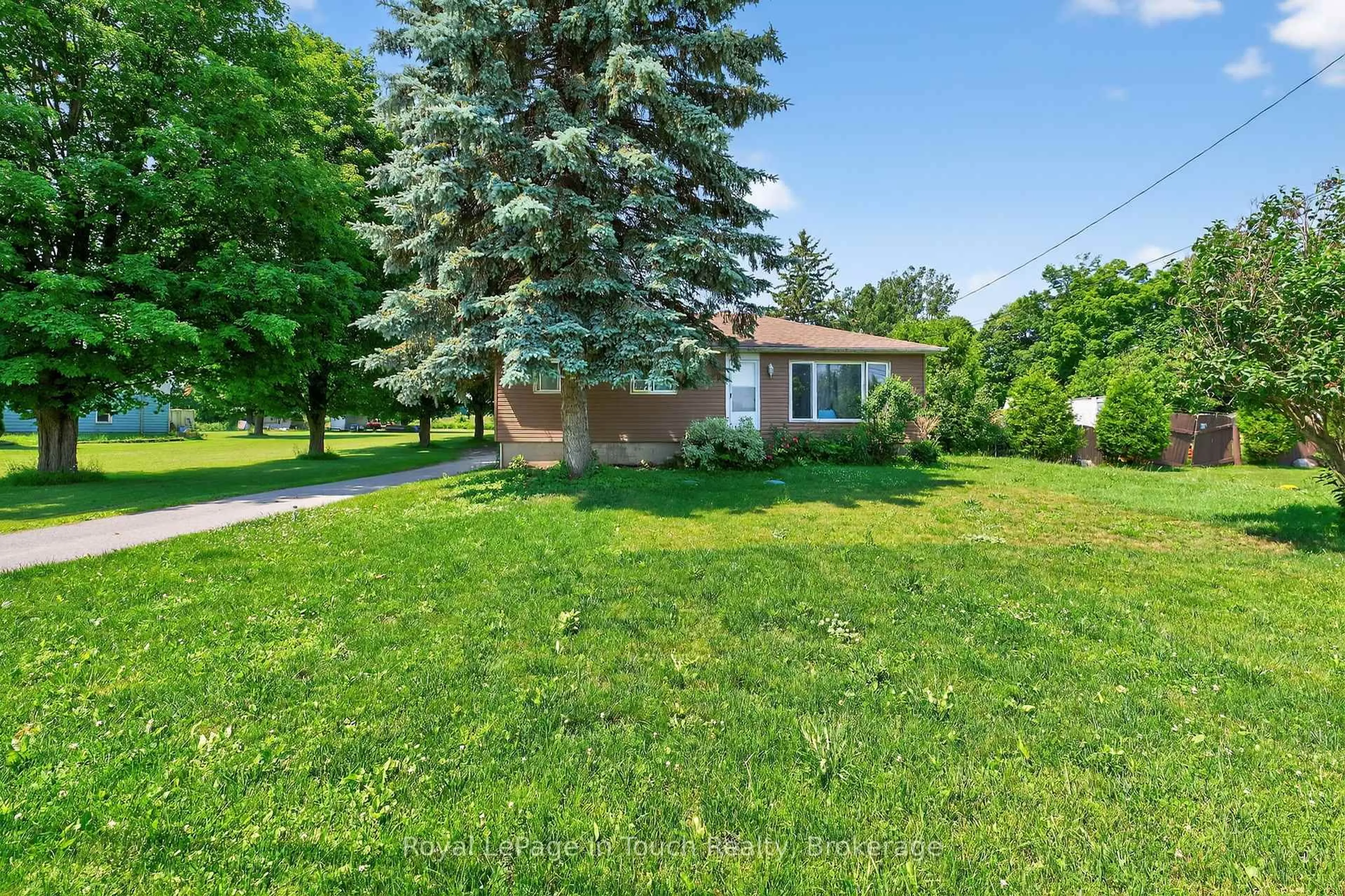 A pic from outside/outdoor area/front of a property/back of a property/a pic from drone, street for 8906 County Road 93, Midland Ontario L4R 4K4