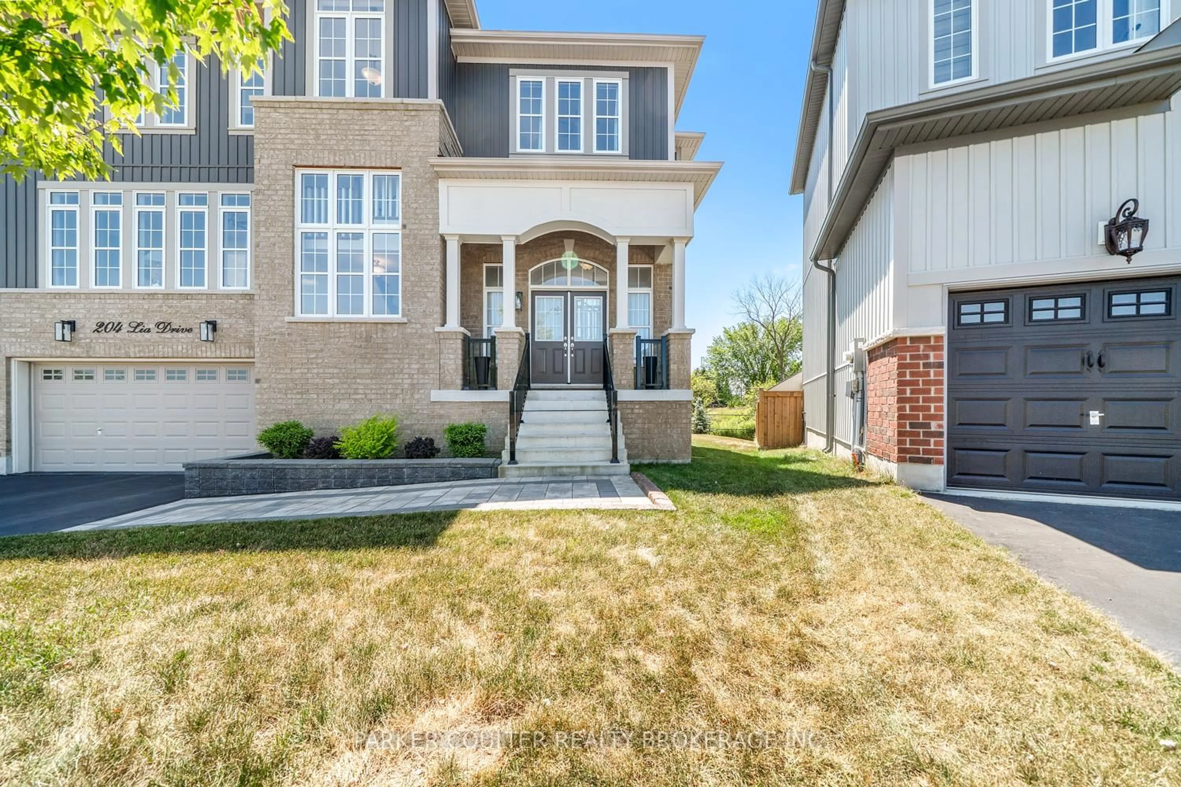 Home with brick exterior material, street for 204 Lia Dr, Clearview Ontario L0M 1S0
