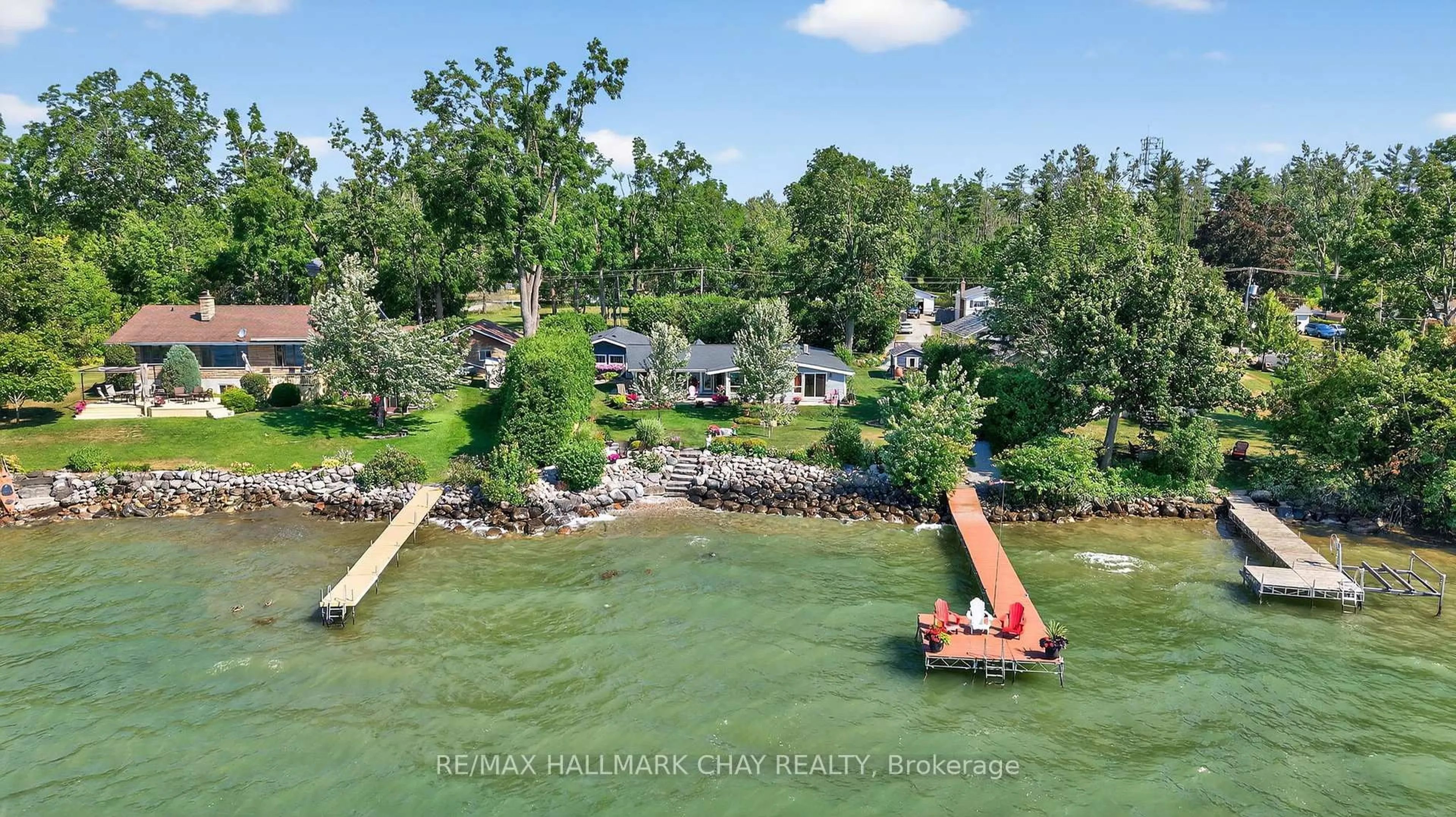 A pic from outside/outdoor area/front of a property/back of a property/a pic from drone, water/lake/river/ocean view for 7 Lakeshore Rd, Oro-Medonte Ontario L0L 2E0