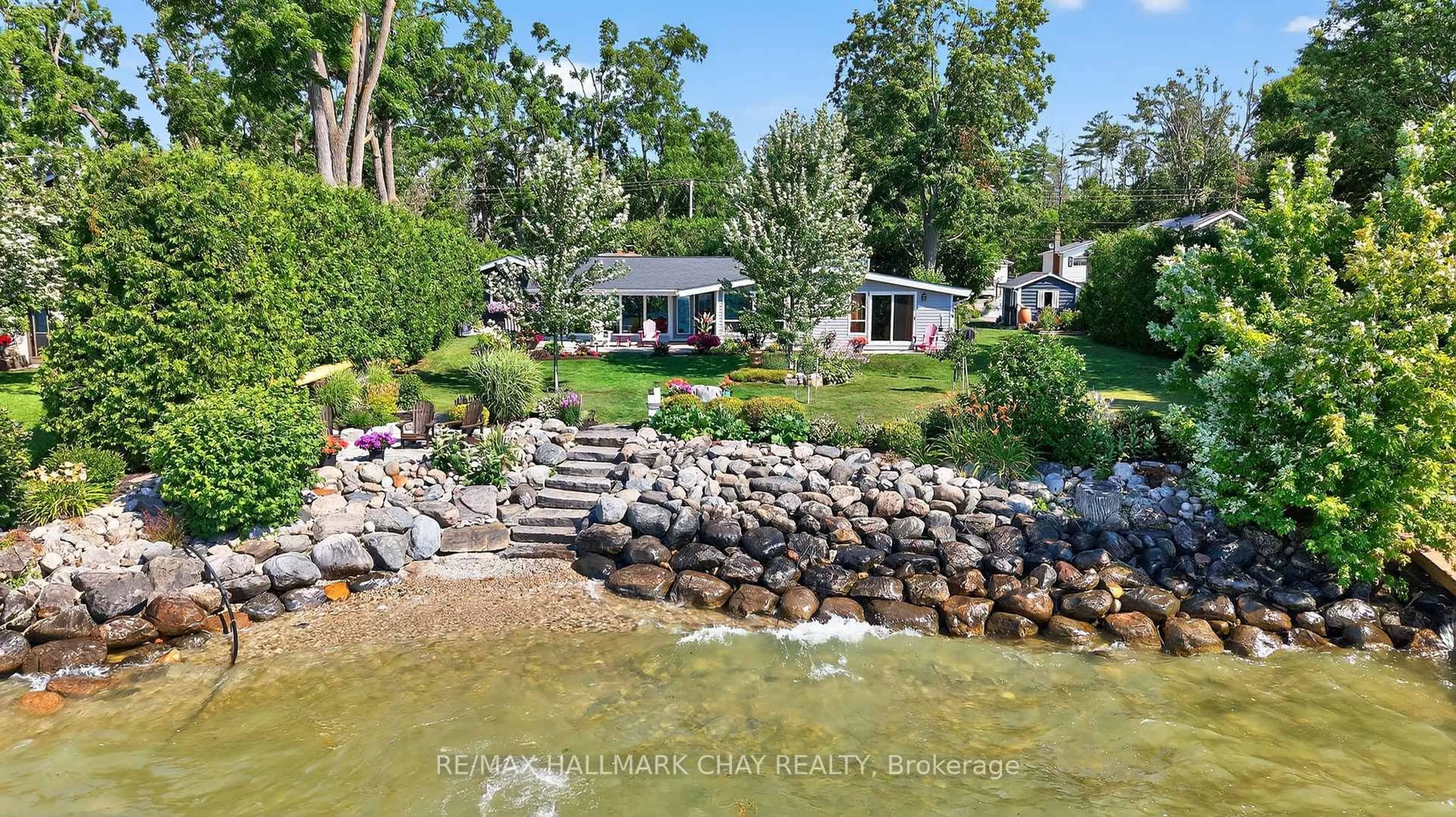 A pic from outside/outdoor area/front of a property/back of a property/a pic from drone, water/lake/river/ocean view for 7 Lakeshore Rd, Oro-Medonte Ontario L0L 2E0