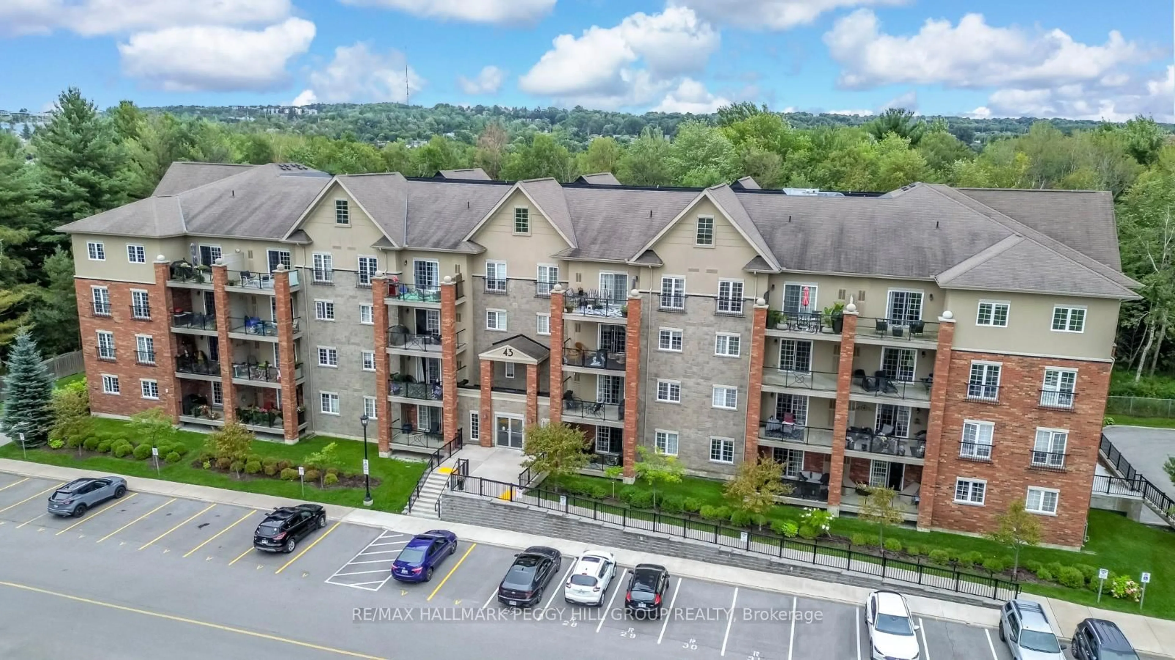 A pic from outside/outdoor area/front of a property/back of a property/a pic from drone, unknown for 43 Ferndale Dr #305, Barrie Ontario L4N 5W6