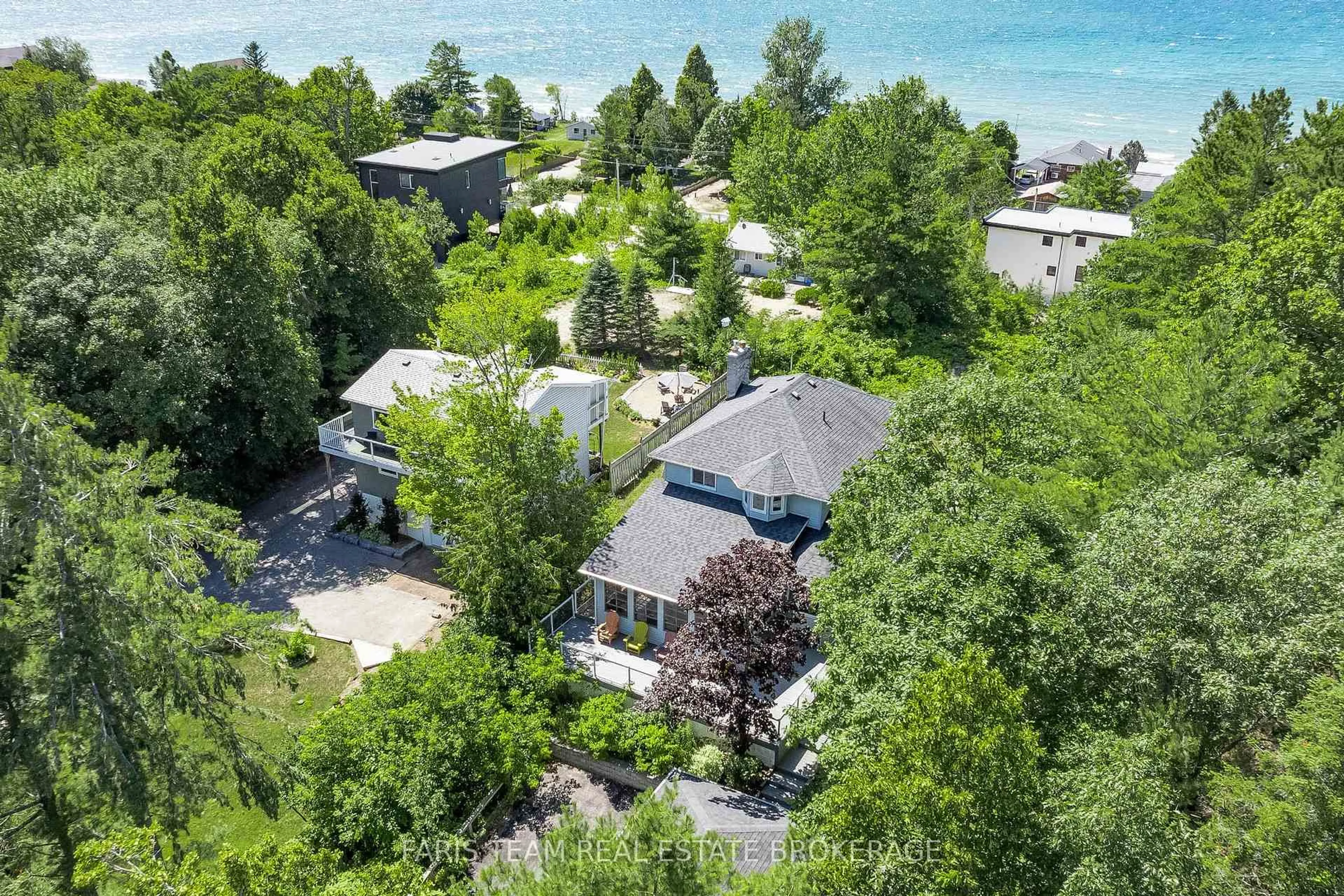 A pic from outside/outdoor area/front of a property/back of a property/a pic from drone, water/lake/river/ocean view for 8 Glen Forest Tr, Tiny Ontario L0L 2T0