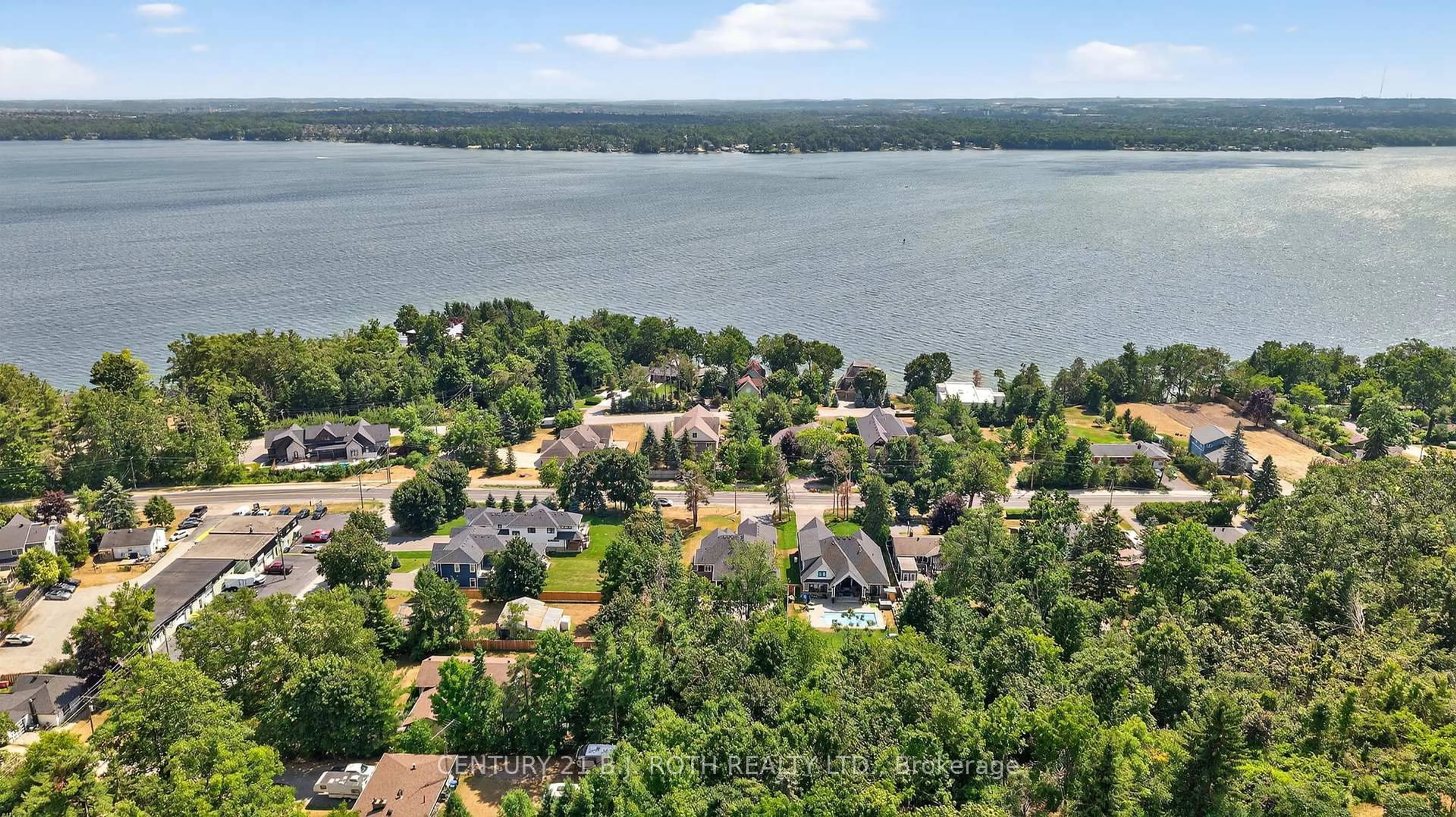 A pic from outside/outdoor area/front of a property/back of a property/a pic from drone, water/lake/river/ocean view for 300 Shanty Bay Rd, Oro-Medonte Ontario L4M 1E6