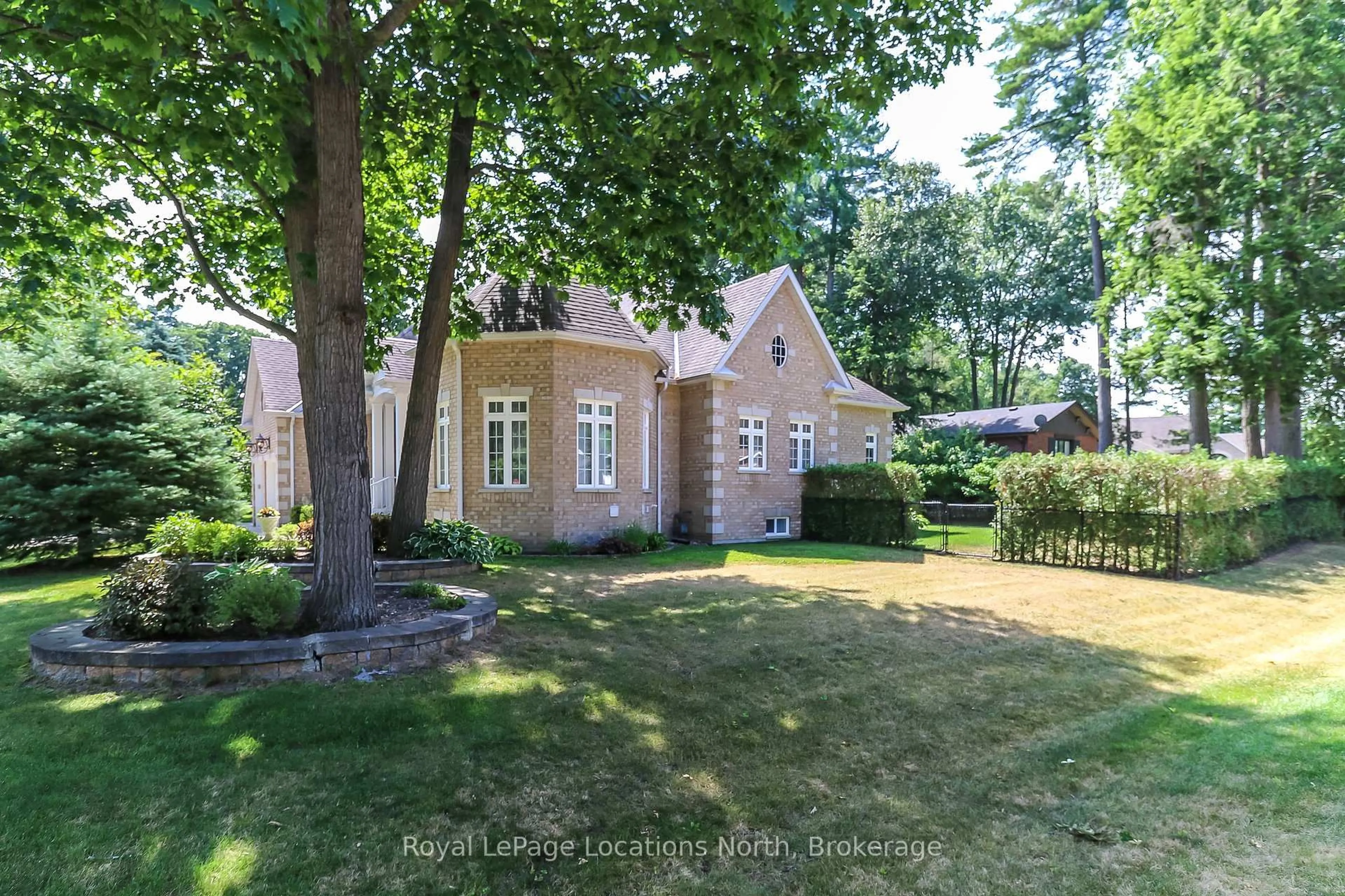 Home with brick exterior material, street for 15 Downer Cres, Wasaga Beach Ontario L9Z 1C2
