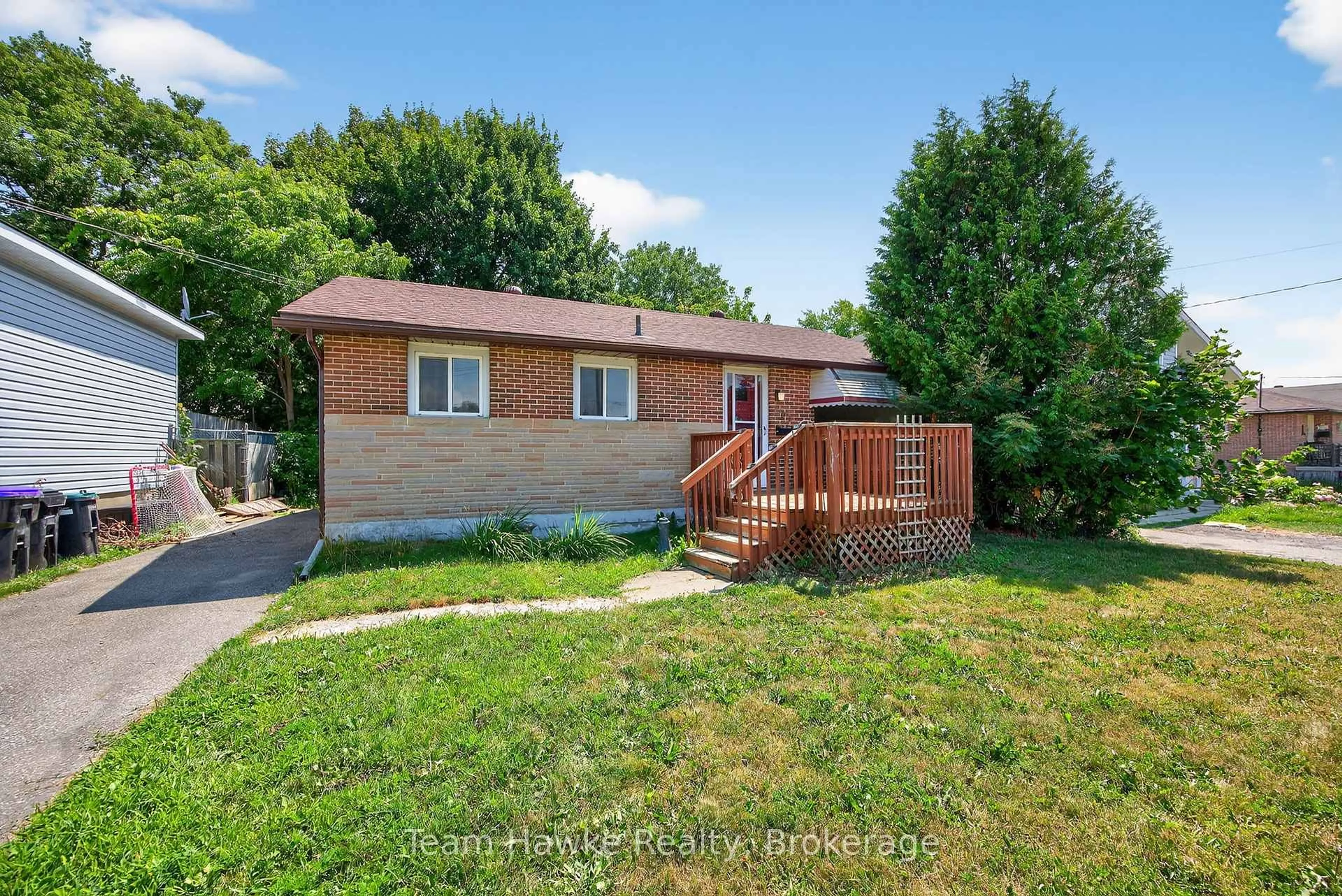 Home with brick exterior material, street for 303 Scott St, Midland Ontario L4R 2M9