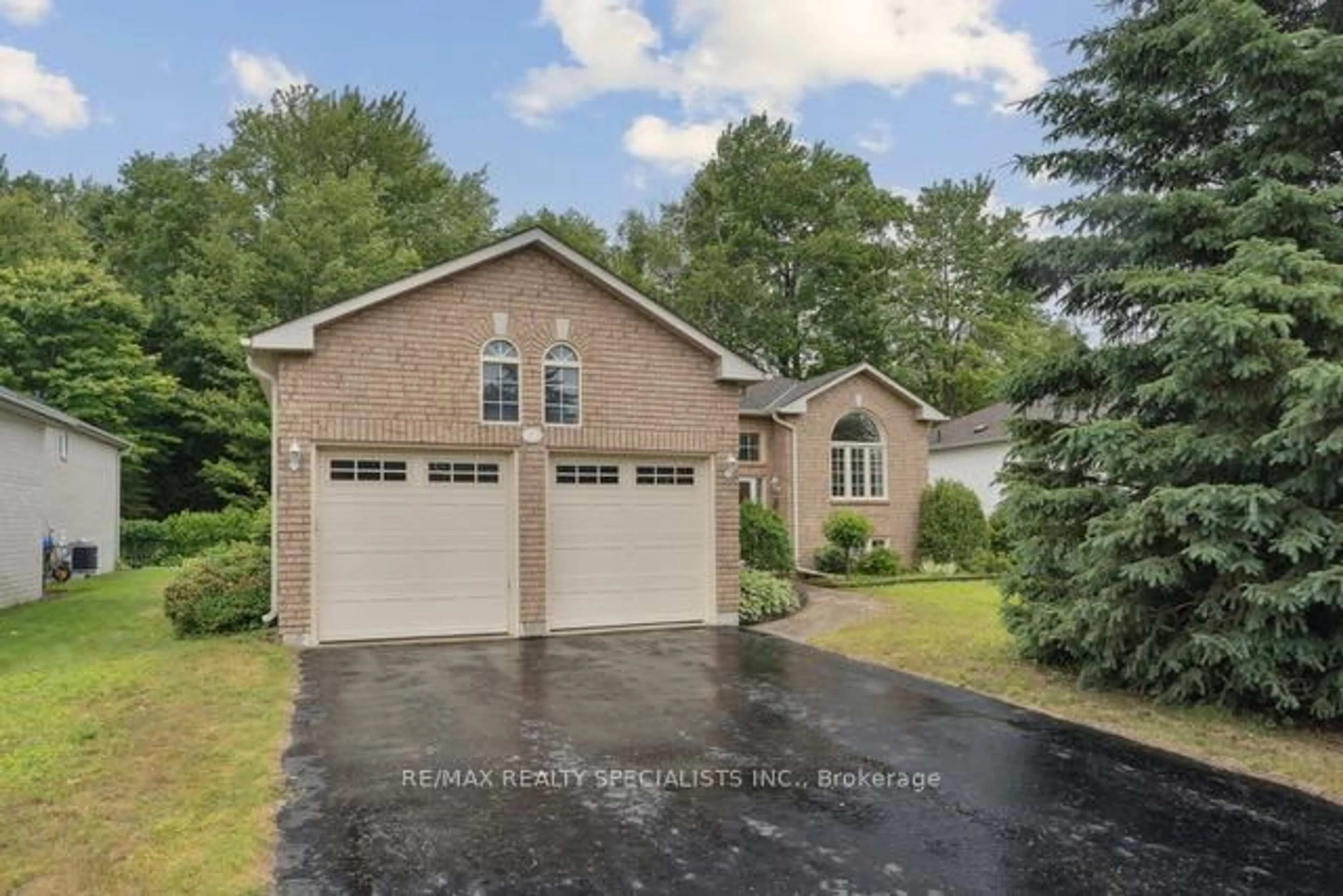 Home with brick exterior material, street for 62 Silver Birch Ave, Wasaga Beach Ontario L9Z 1M2