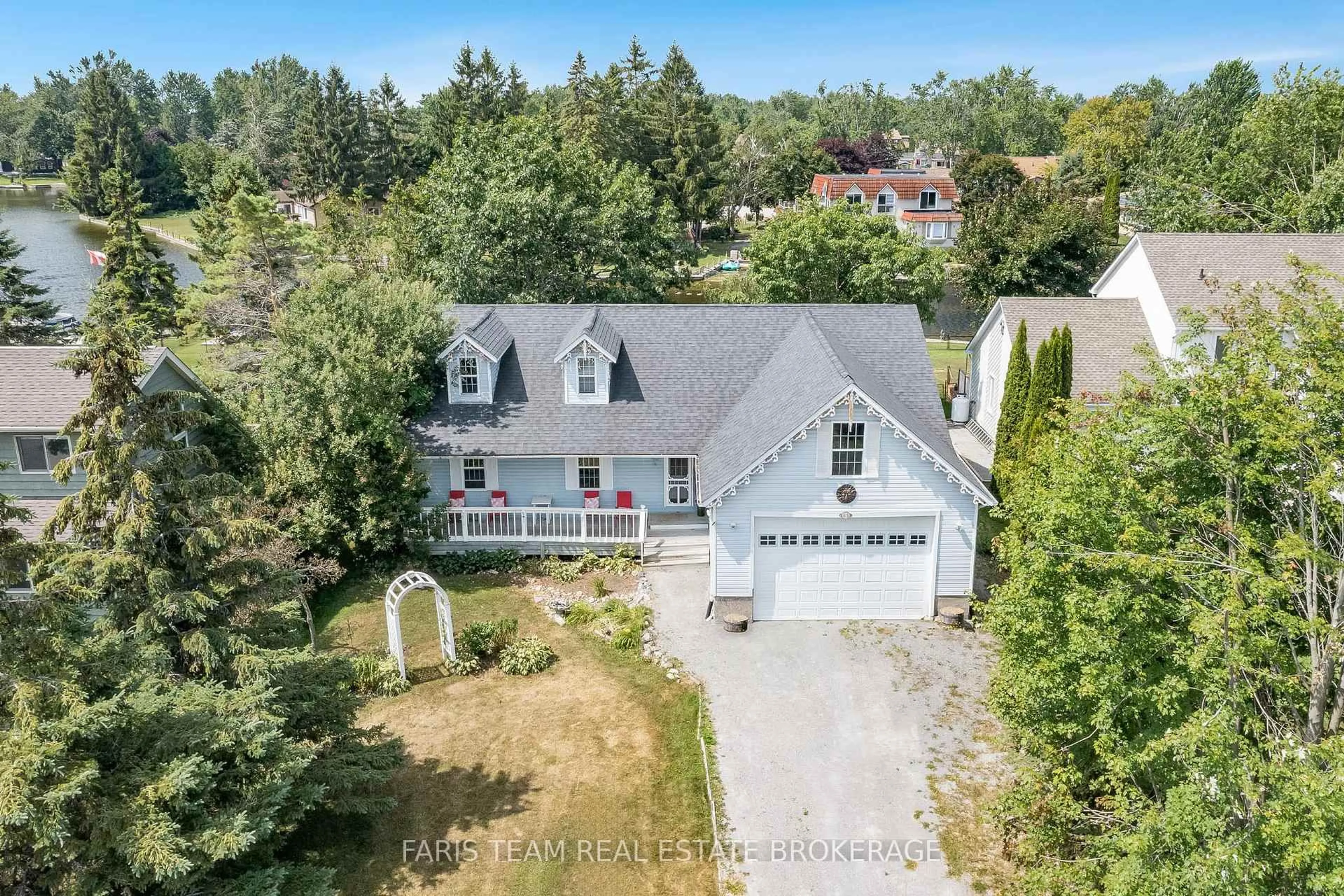 A pic from outside/outdoor area/front of a property/back of a property/a pic from drone, water/lake/river/ocean view for 69 Turtle Path, Ramara Ontario L0K 1B0