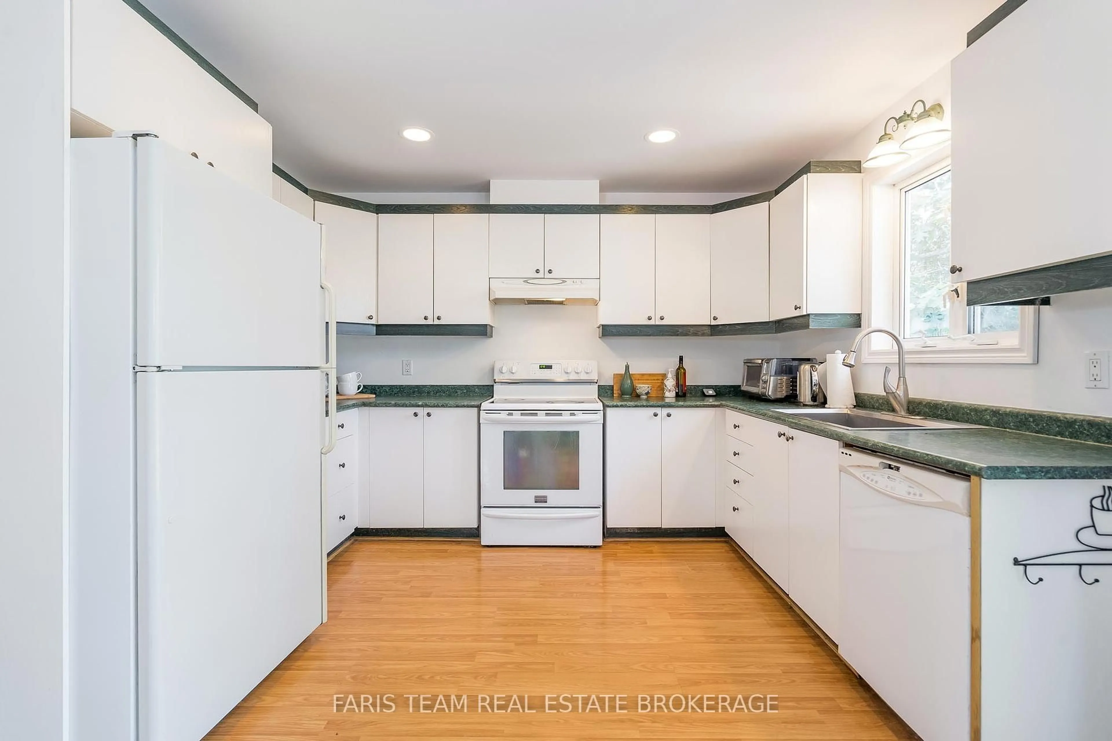 Standard kitchen, wood/laminate floor for 69 Turtle Path, Ramara Ontario L0K 1B0