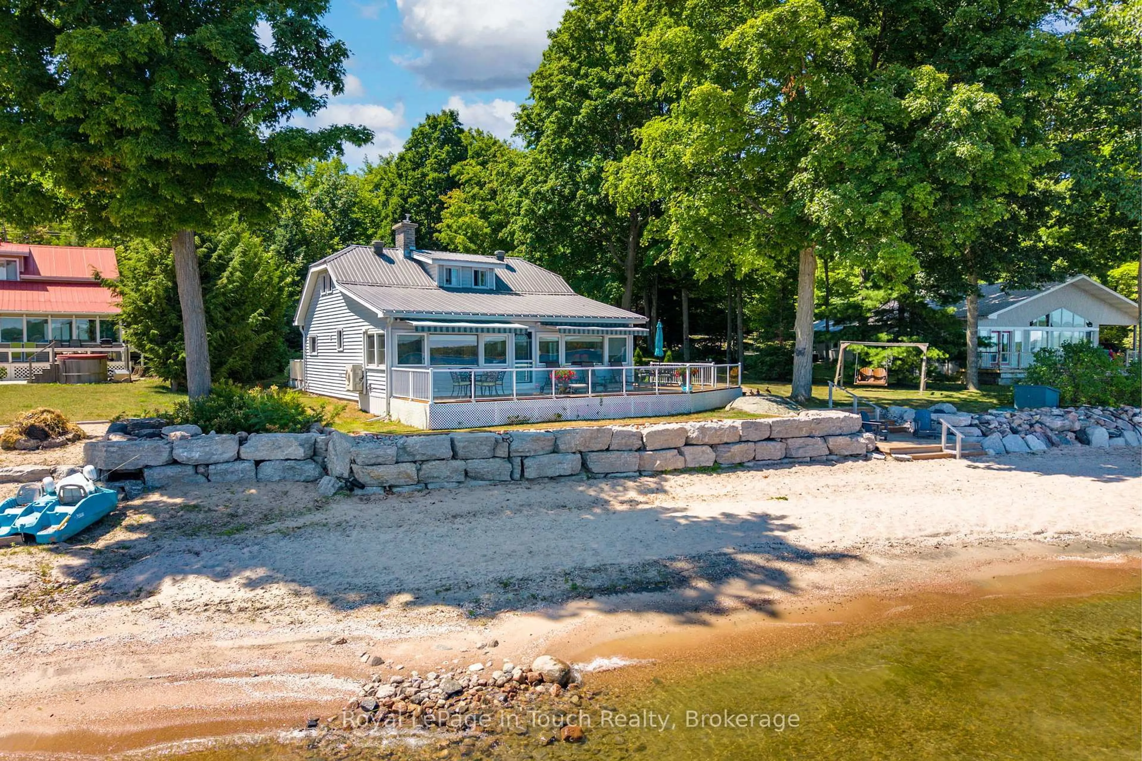 A pic from outside/outdoor area/front of a property/back of a property/a pic from drone, water/lake/river/ocean view for 1443 Champlain Rd, Tiny Ontario L9M 0C1