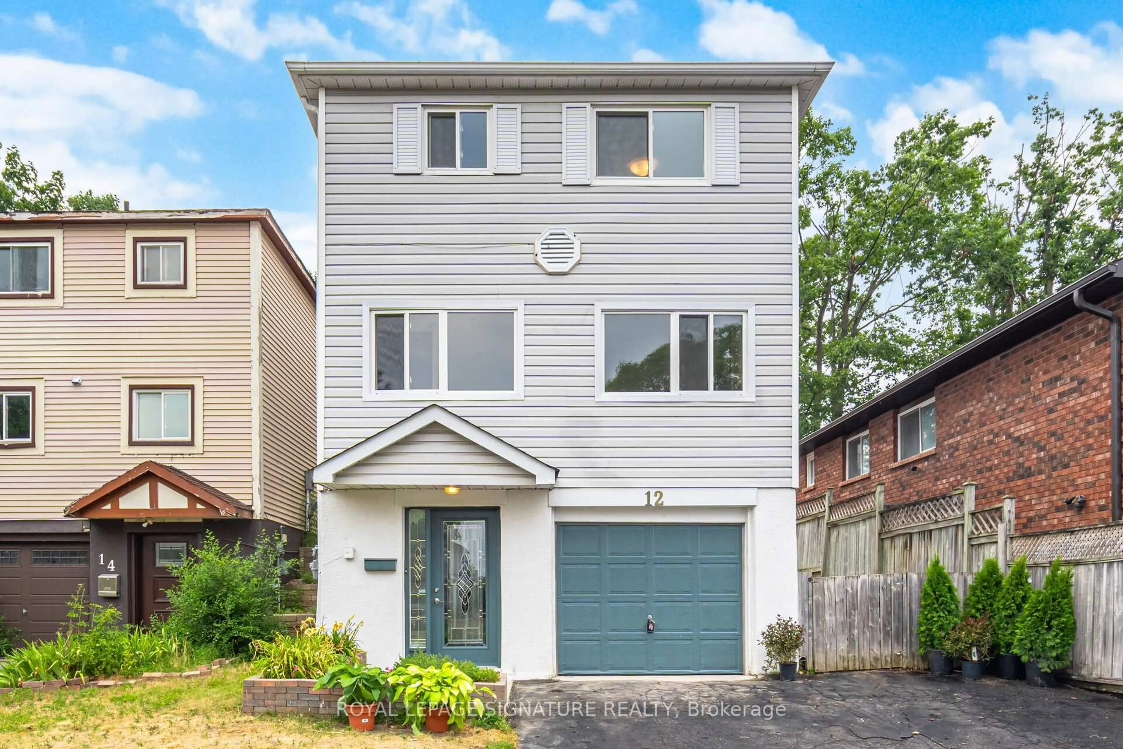Home with brick exterior material, street for 12 Browning Tr, Barrie Ontario L4N 4Z4