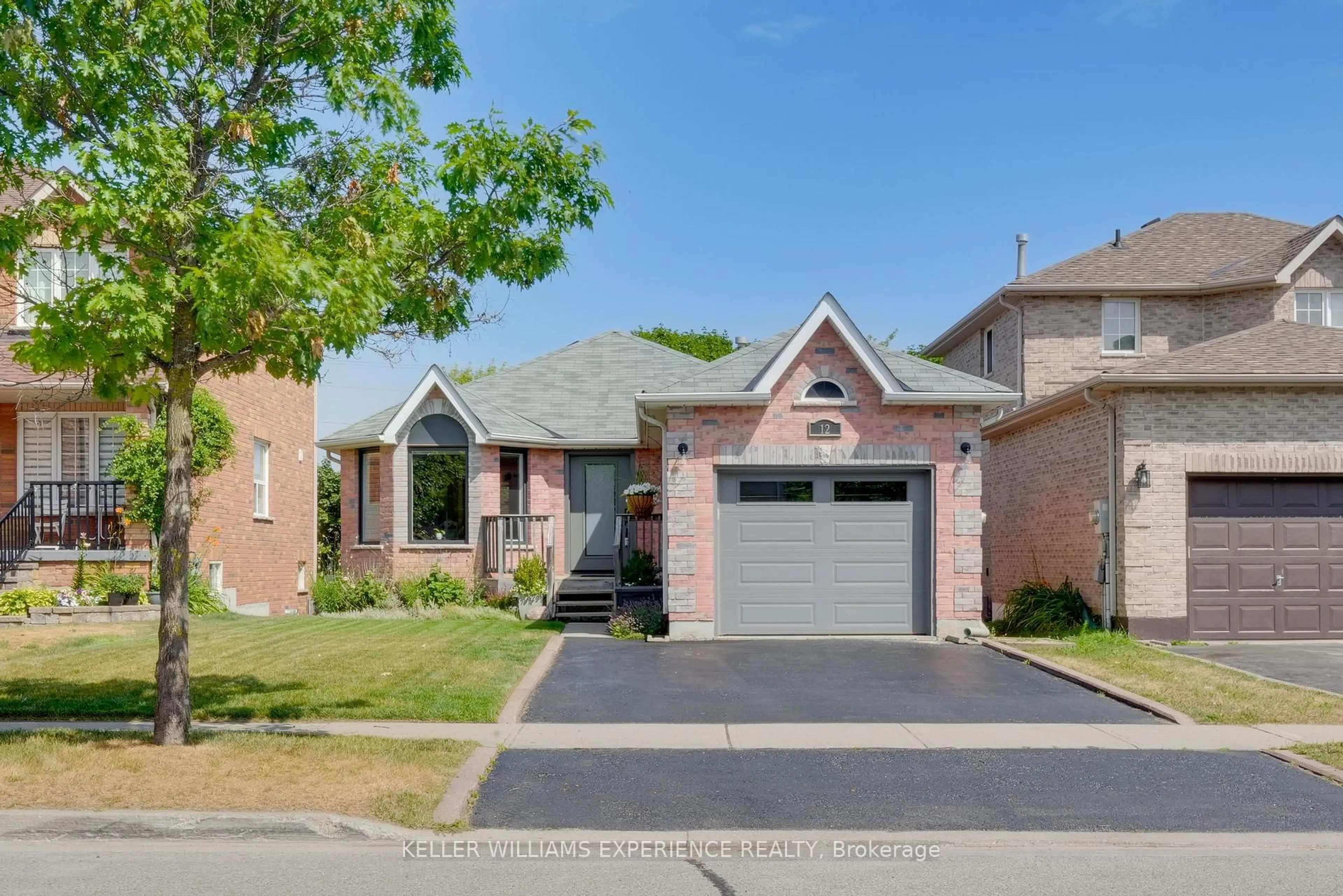 Home with brick exterior material, street for 12 Dunnett Dr, Barrie Ontario L4N 0H9