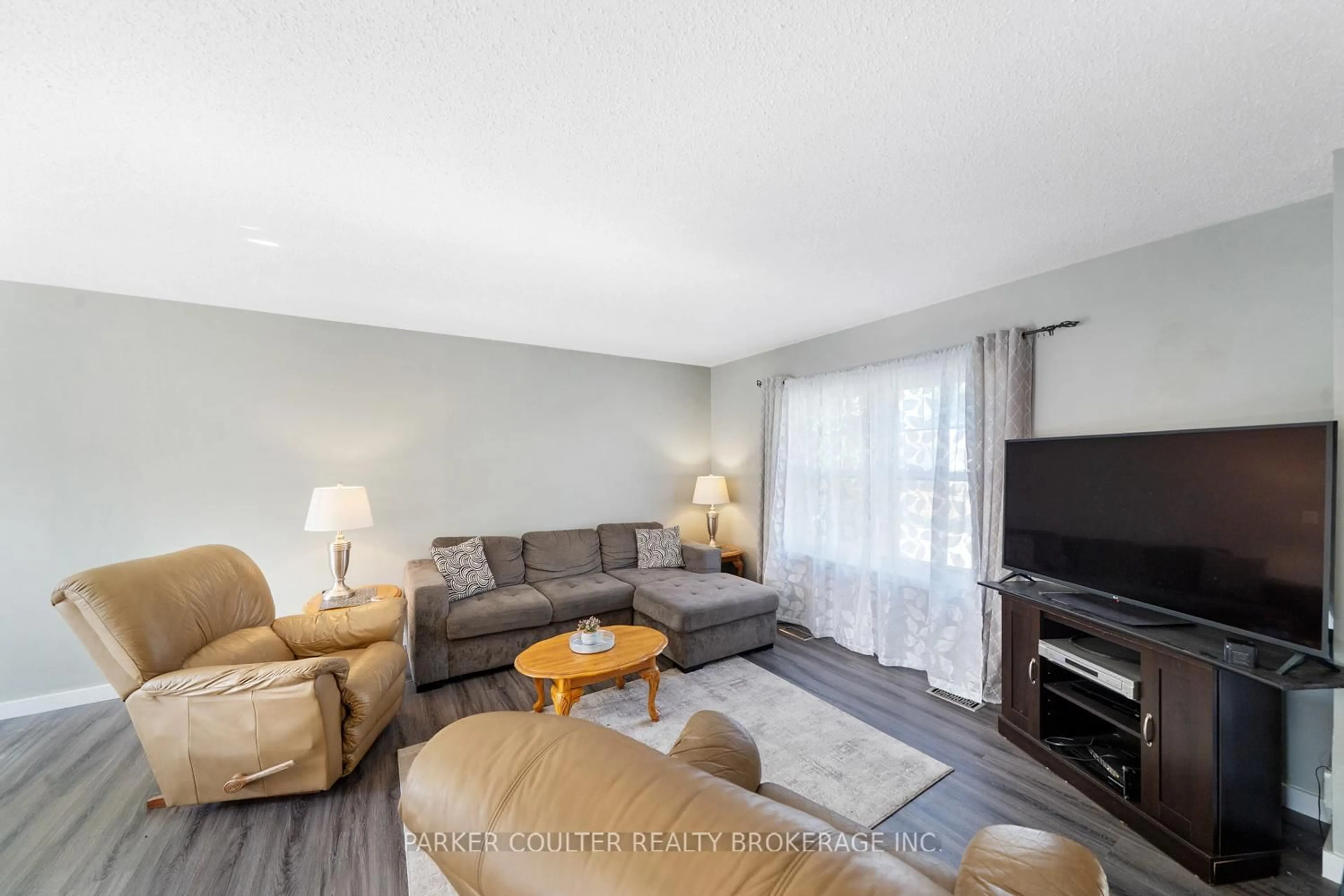 Living room with furniture, unknown for 62 Riverdale Dr, Wasaga Beach Ontario L9Z 1G1
