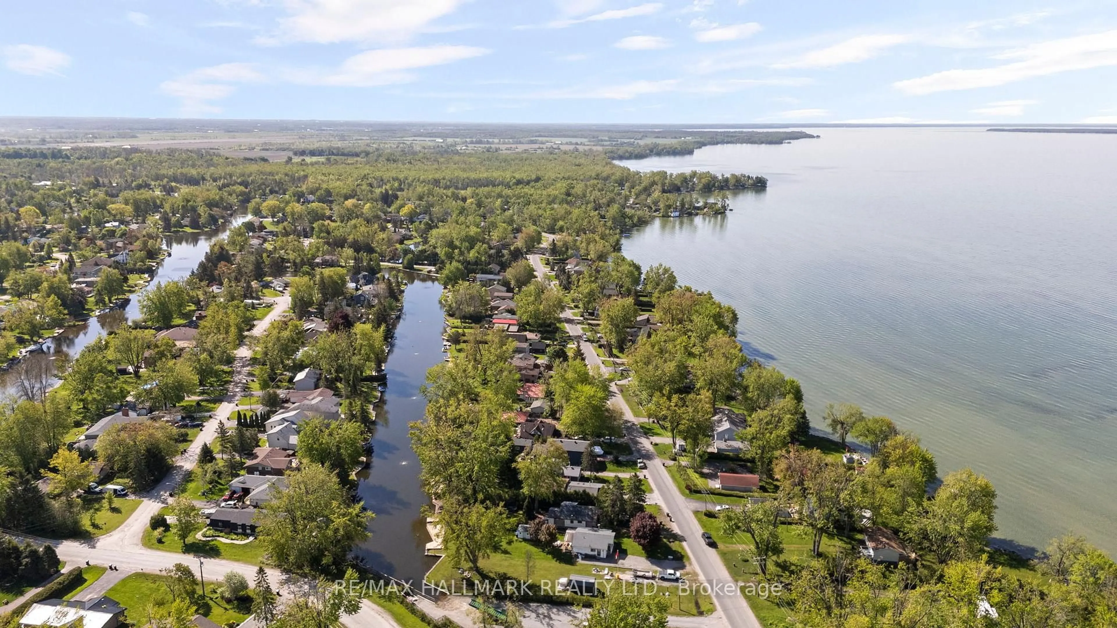 A pic from outside/outdoor area/front of a property/back of a property/a pic from drone, water/lake/river/ocean view for 95 Lake Ave, Ramara Ontario L0K 1B0