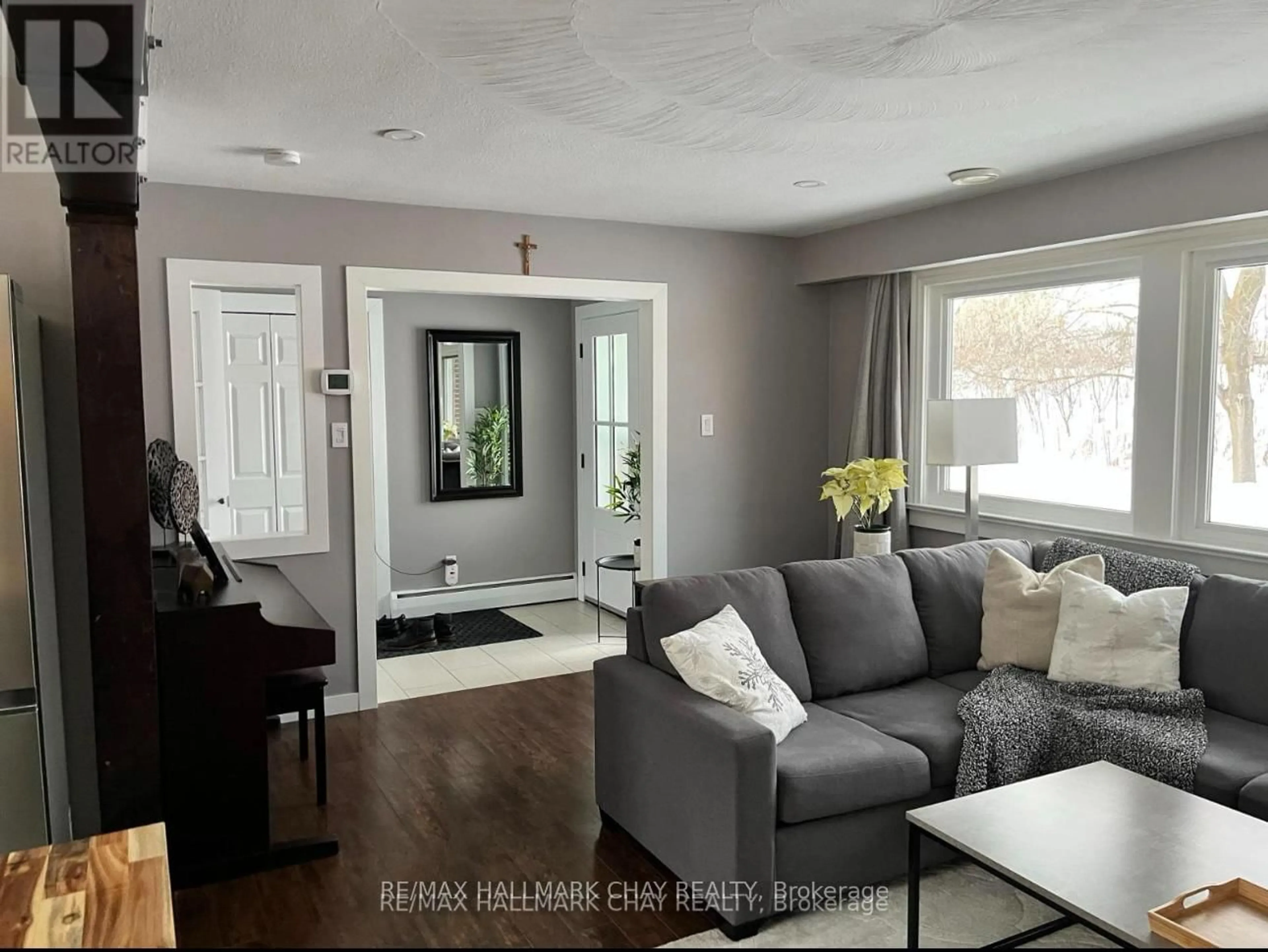 Living room with furniture, unknown for 595 Big Bay Point Rd, Barrie Ontario L4N 3Z9