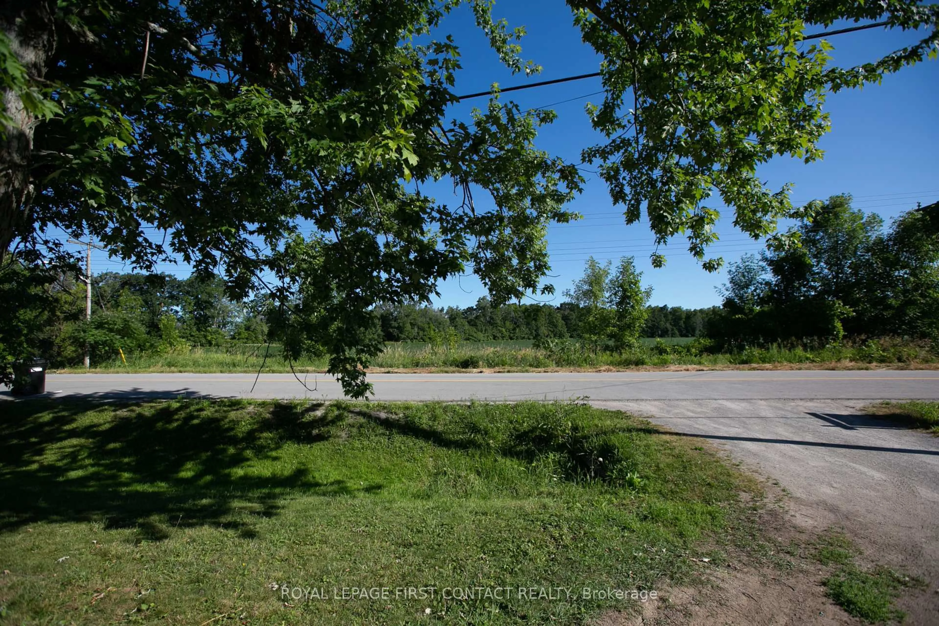 A pic from outside/outdoor area/front of a property/back of a property/a pic from drone, forest/trees view for 3905 Longford Mills Rd, Ramara Ontario L3V 1G4