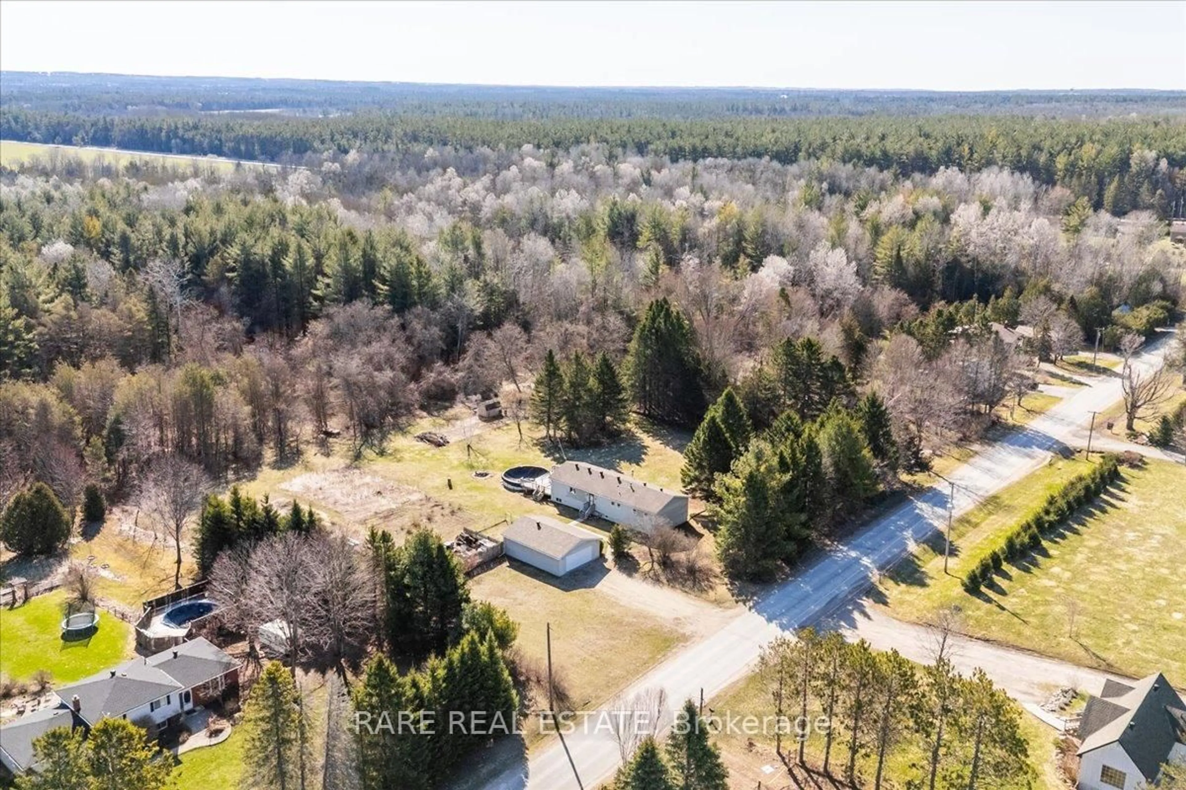A pic from outside/outdoor area/front of a property/back of a property/a pic from drone, forest/trees view for 3679 McCarthy Dr, Clearview Ontario L0M 1N0