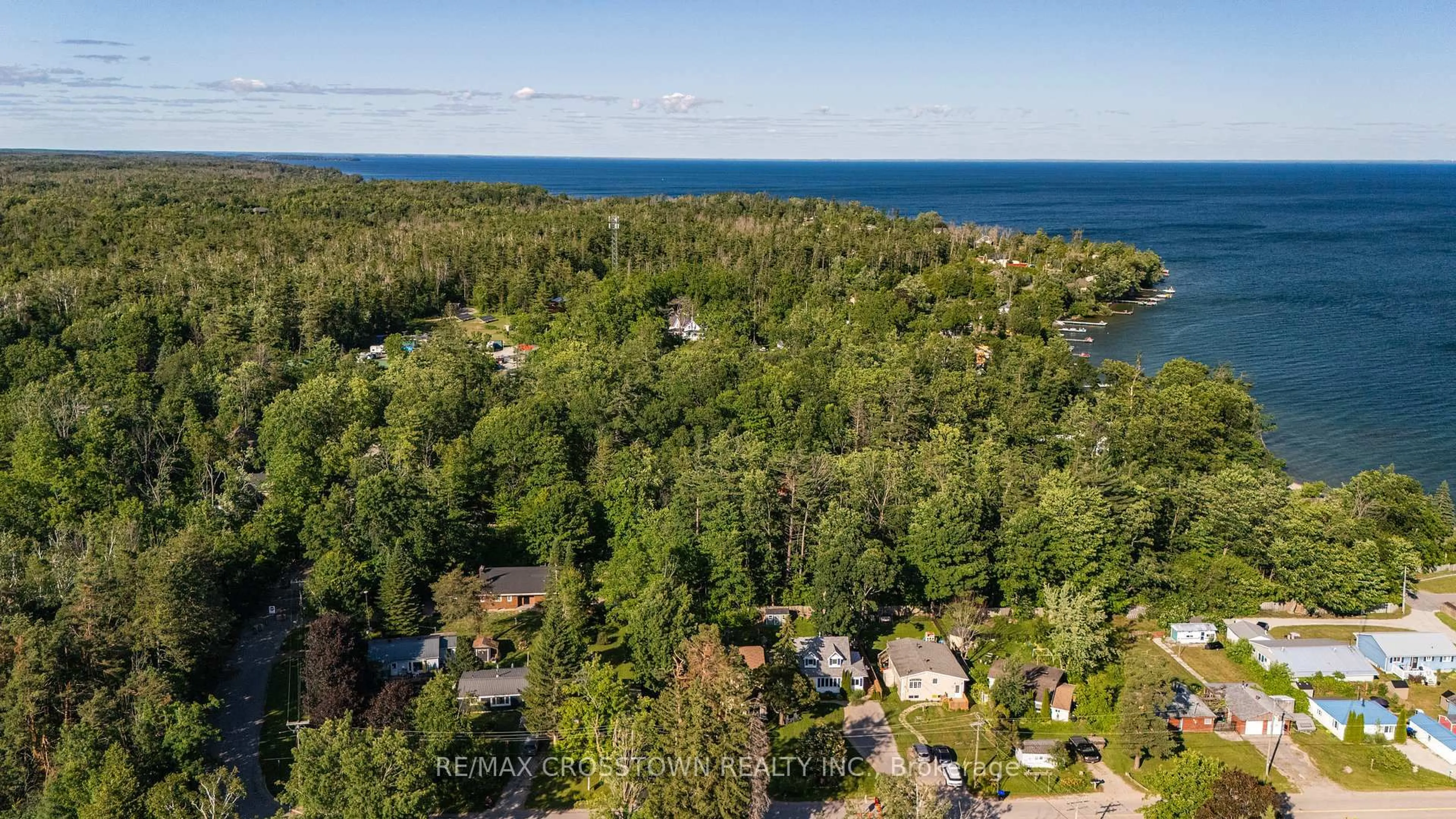 A pic from outside/outdoor area/front of a property/back of a property/a pic from drone, water/lake/river/ocean view for 47 Lakeshore Rd, Oro-Medonte Ontario L0L 2E0