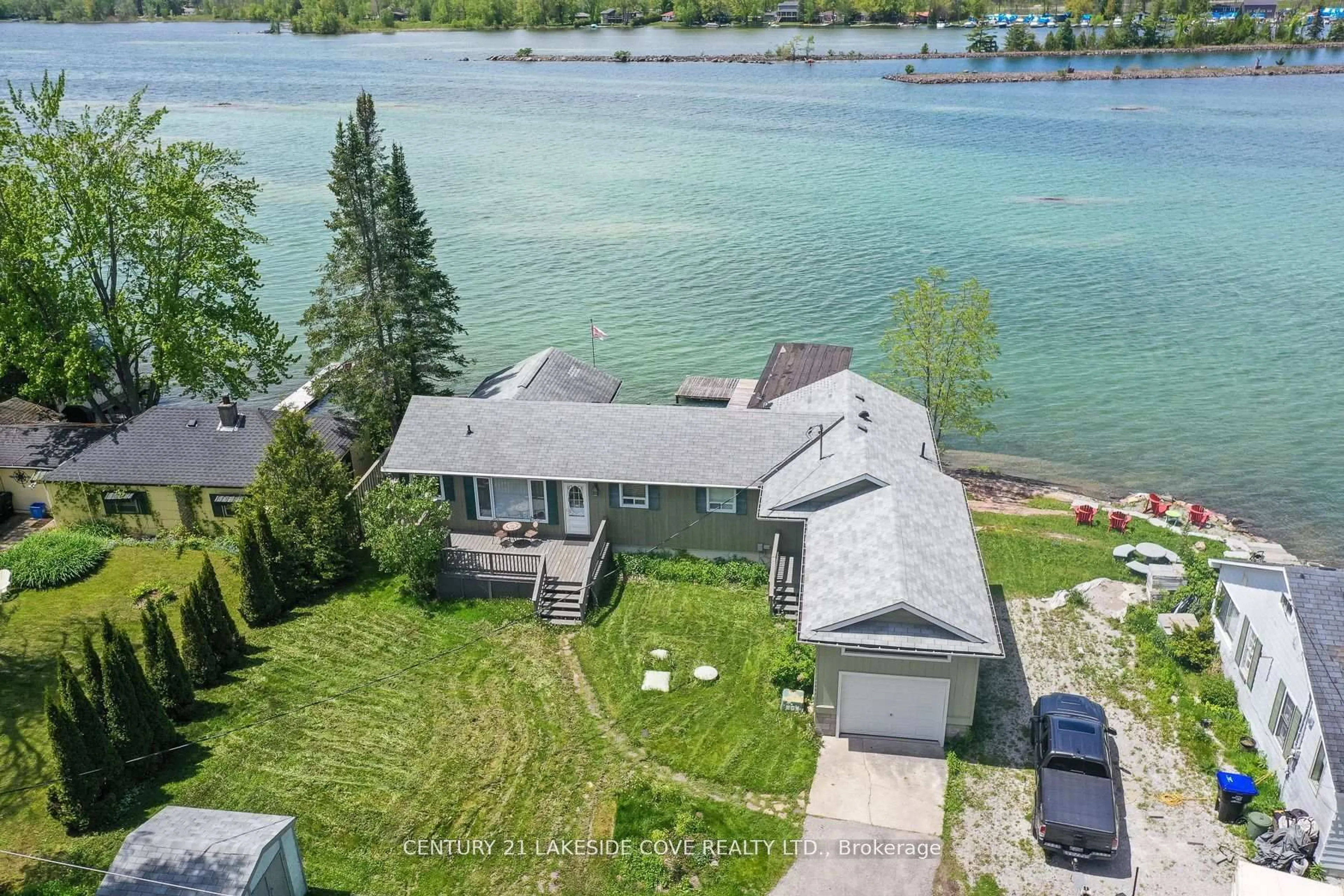 A pic from outside/outdoor area/front of a property/back of a property/a pic from drone, water/lake/river/ocean view for 7712 Oak Point Rd, Ramara Ontario L0K 2B0