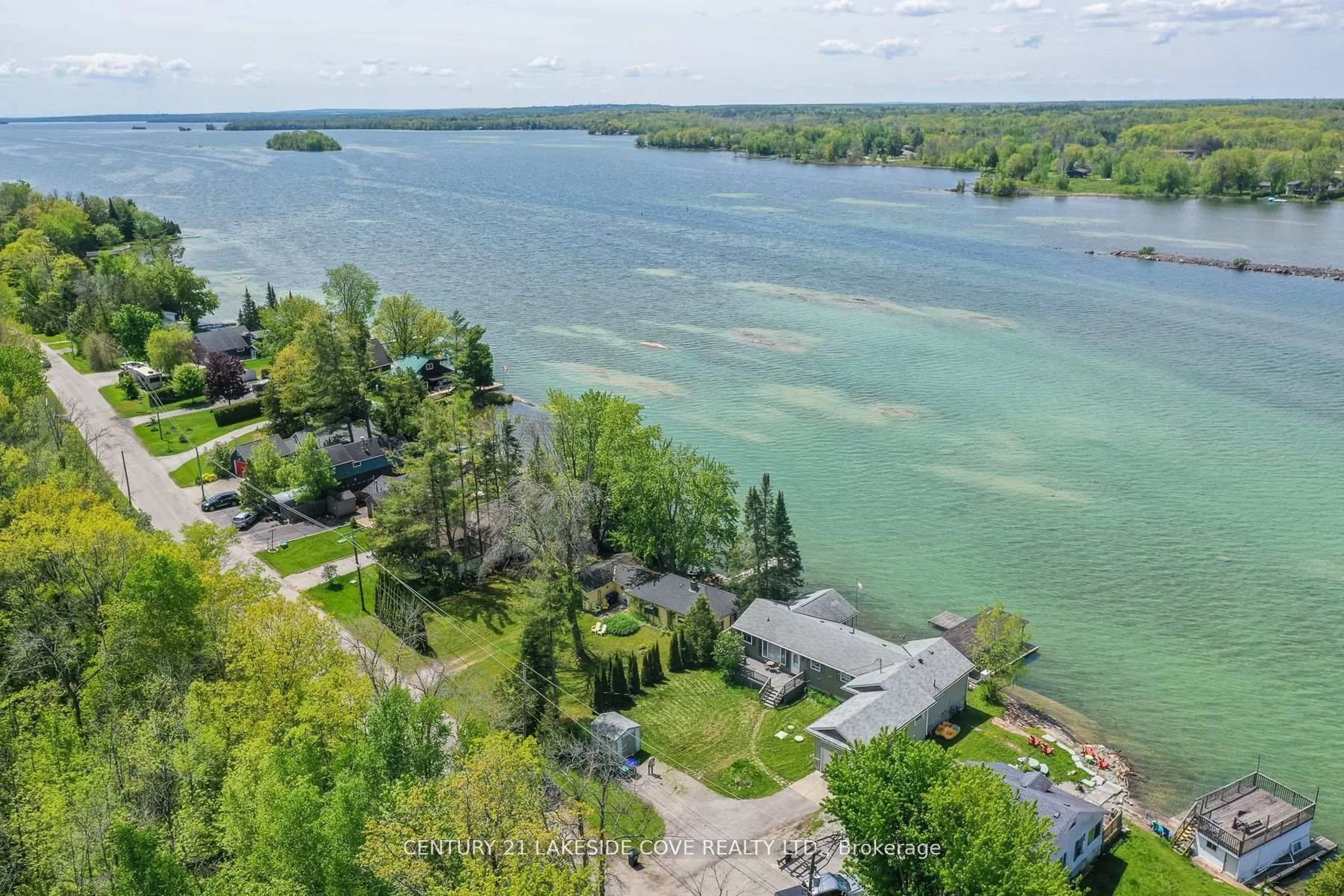 A pic from outside/outdoor area/front of a property/back of a property/a pic from drone, water/lake/river/ocean view for 7712 Oak Point Rd, Ramara Ontario L0K 2B0