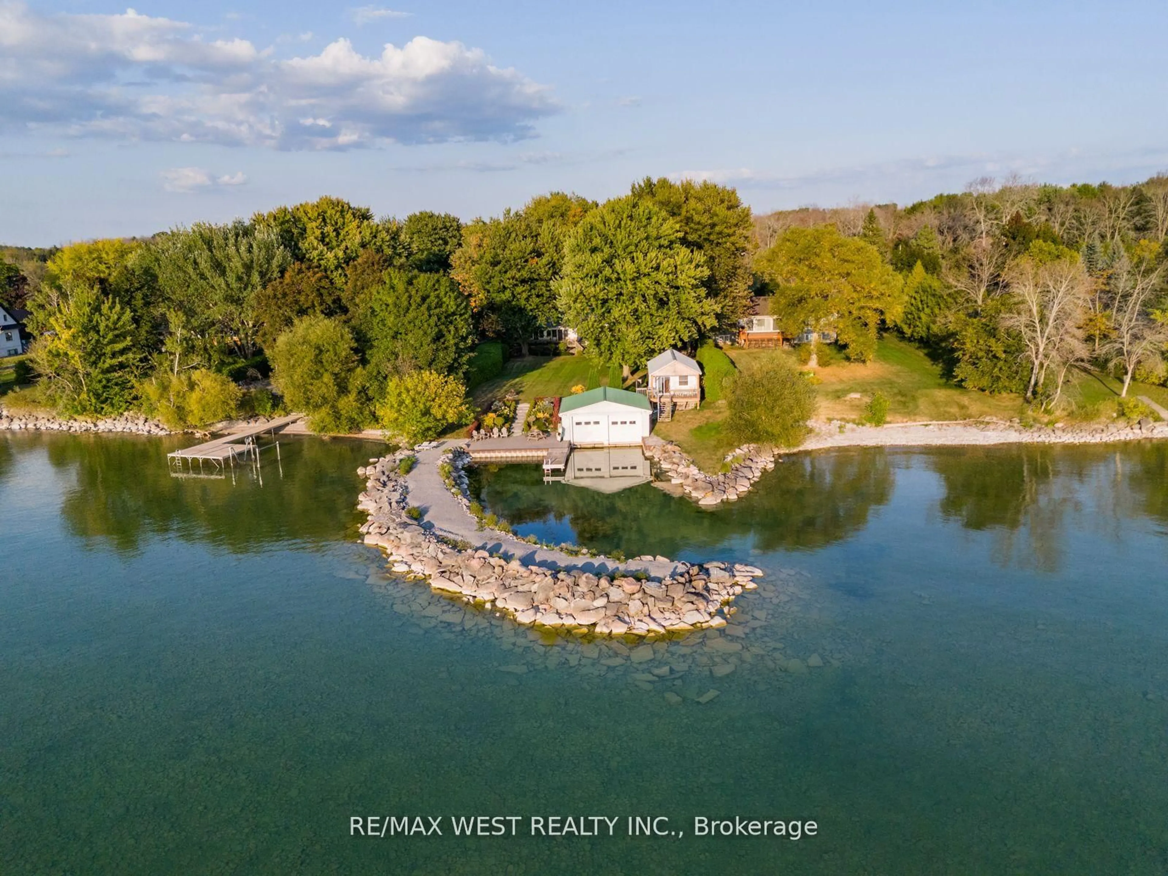 A pic from outside/outdoor area/front of a property/back of a property/a pic from drone, water/lake/river/ocean view for 1668 Lakeshore Dr, Ramara Ontario L0K 1B0