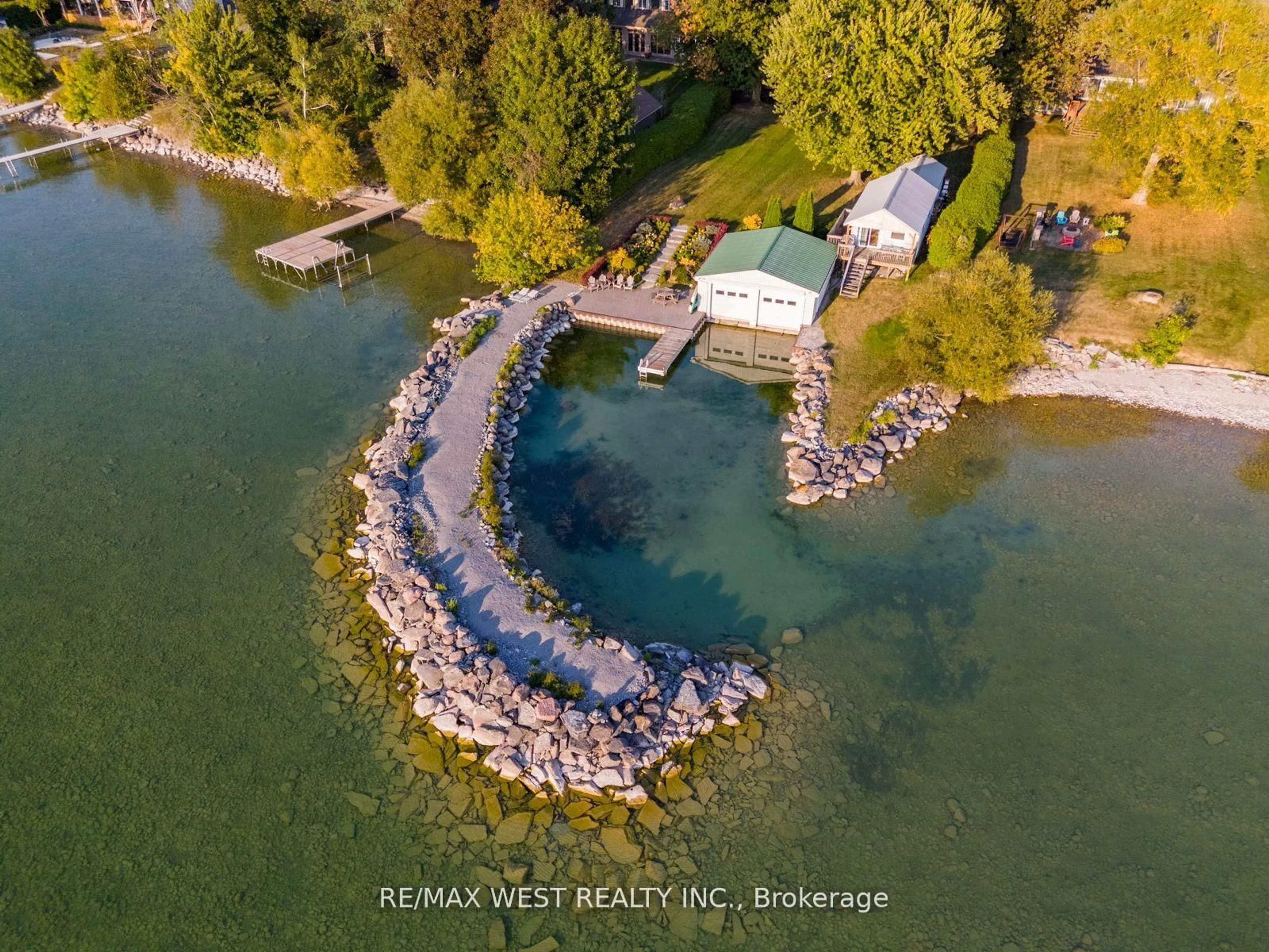 A pic from outside/outdoor area/front of a property/back of a property/a pic from drone, water/lake/river/ocean view for 1668 Lakeshore Dr, Ramara Ontario L0K 1B0