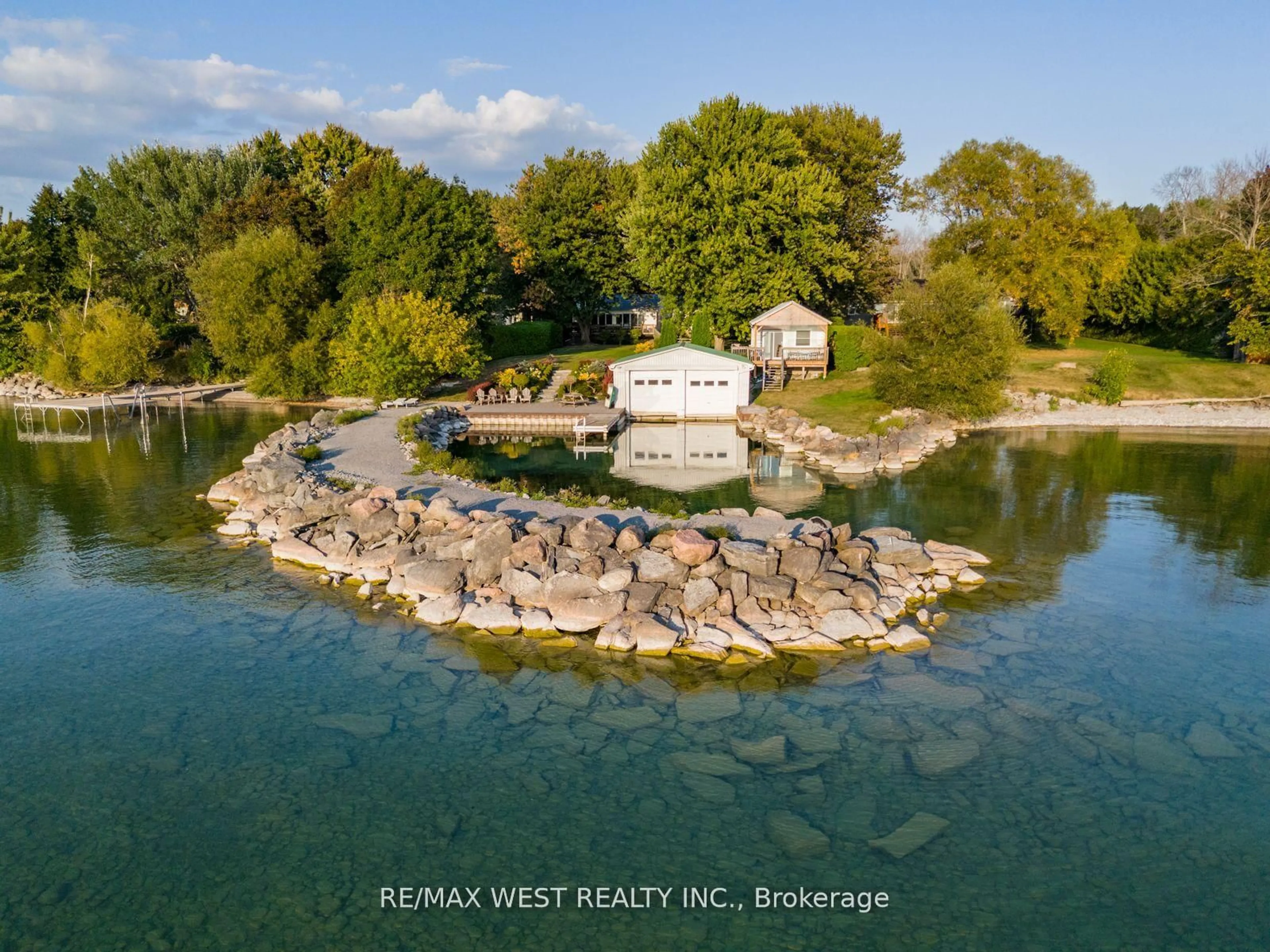 A pic from outside/outdoor area/front of a property/back of a property/a pic from drone, water/lake/river/ocean view for 1668 Lakeshore Dr, Ramara Ontario L0K 1B0