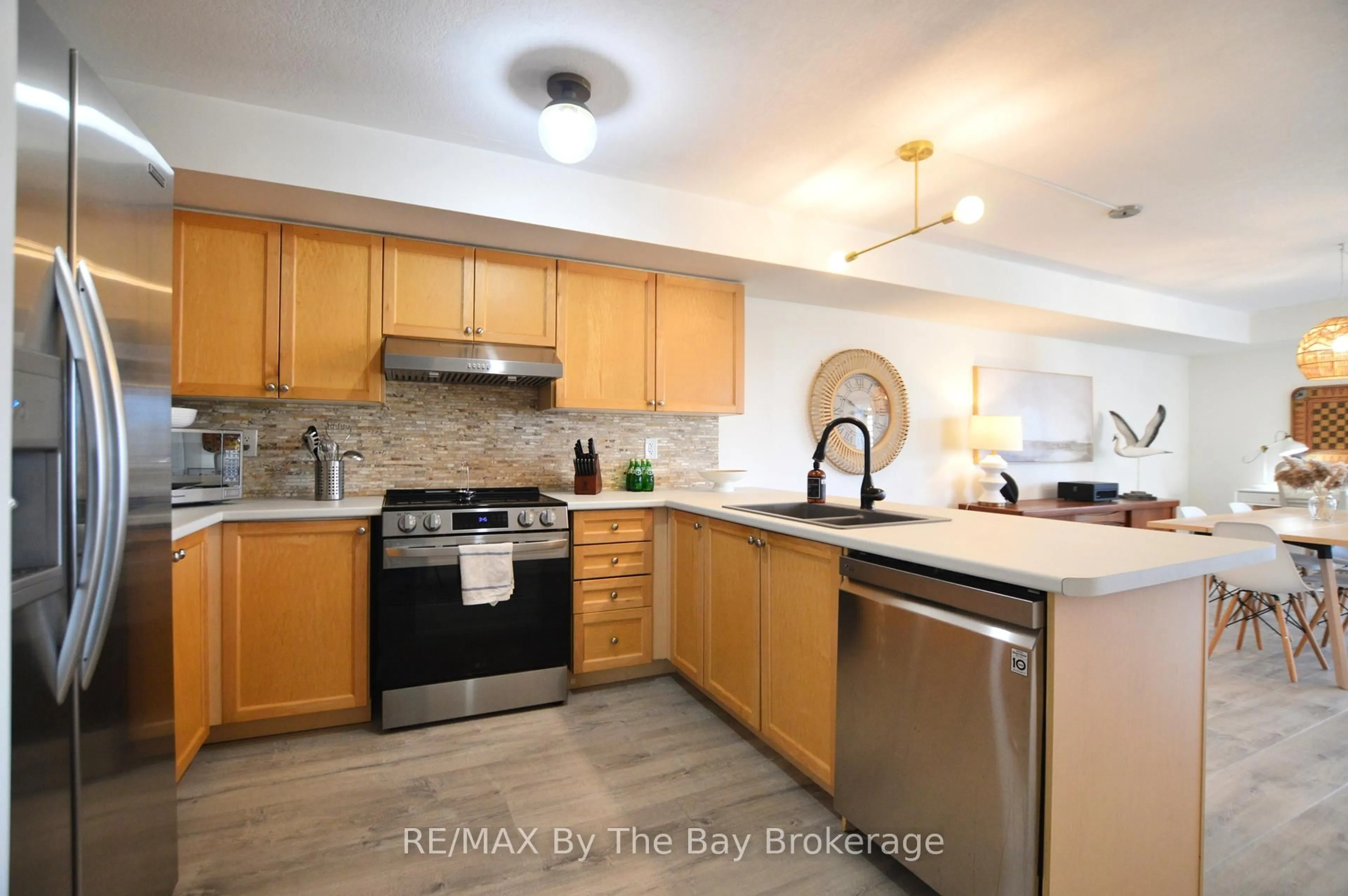 Open concept kitchen, ceramic/tile floor for 194 RIVER Rd #2C, Wasaga Beach Ontario L9Z 2L6
