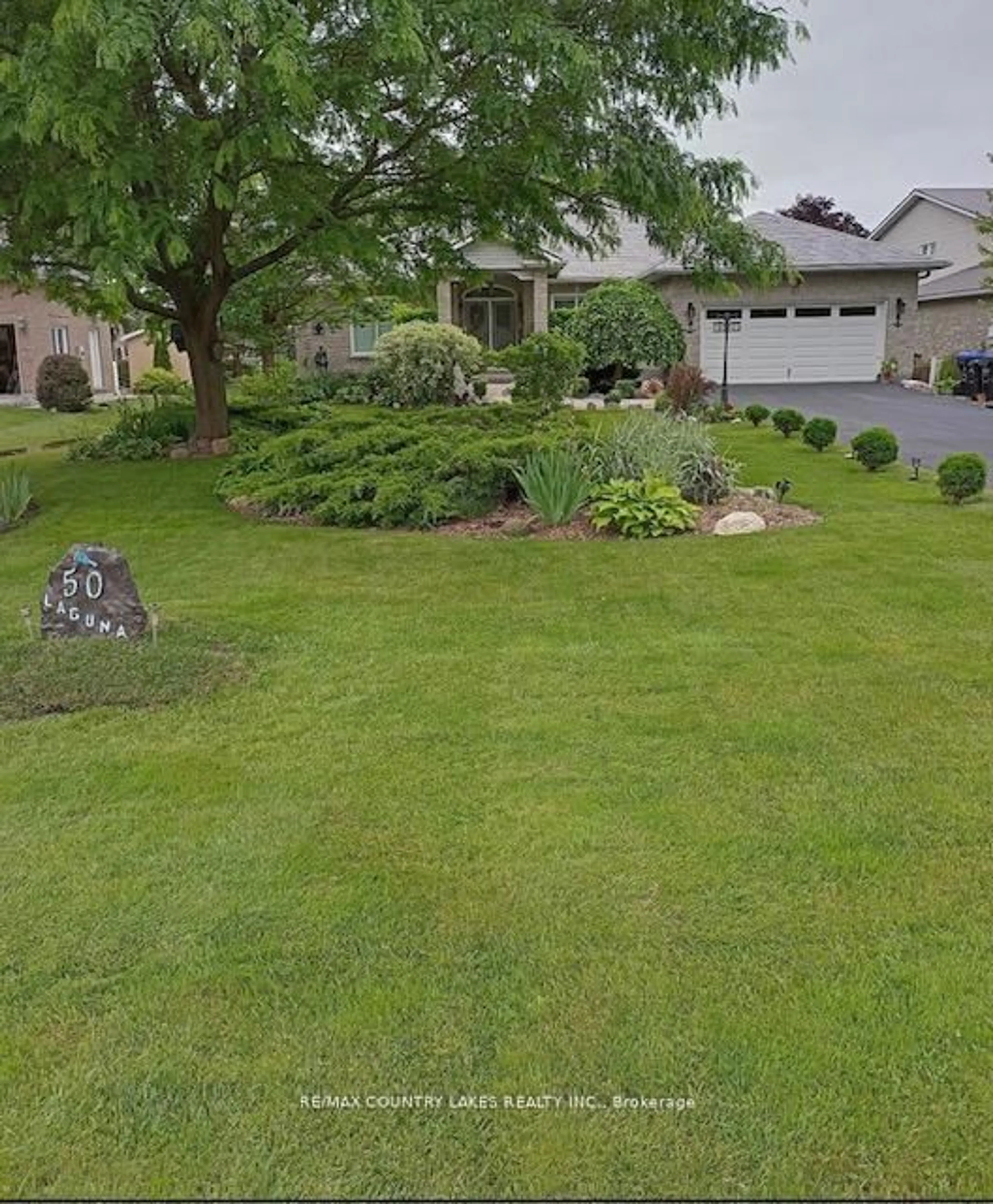 A pic from outside/outdoor area/front of a property/back of a property/a pic from drone, street for 50 Laguna Pkwy, Ramara Ontario L0K 1B0