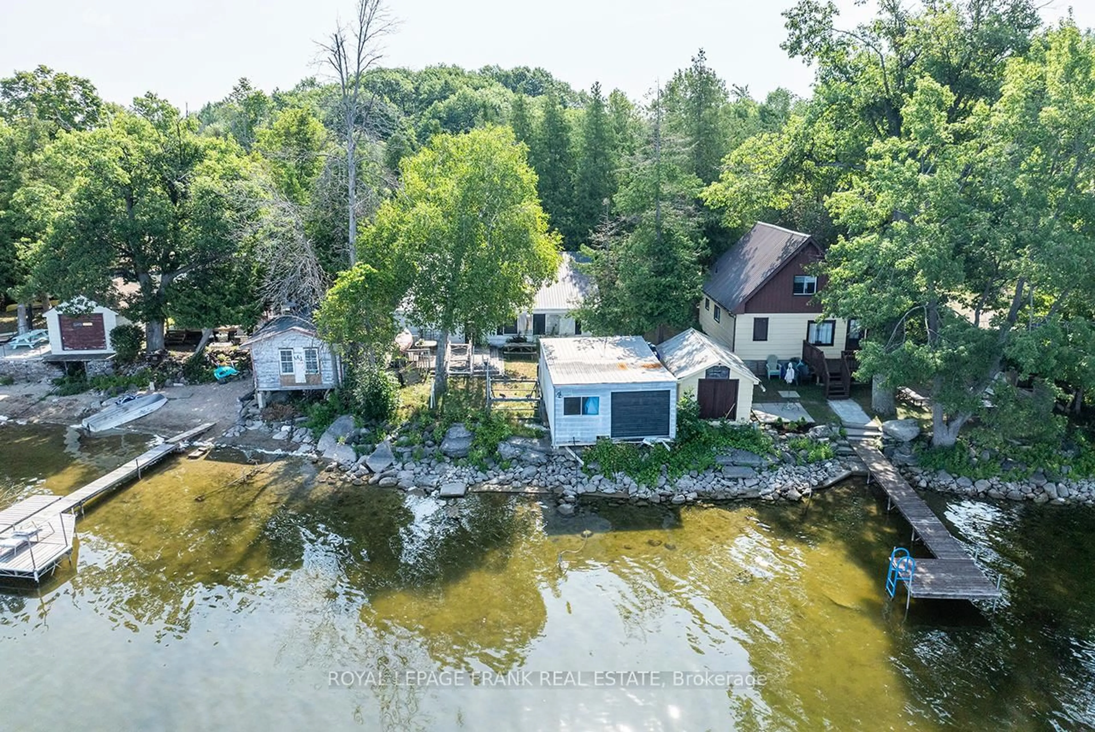 A pic from outside/outdoor area/front of a property/back of a property/a pic from drone, water/lake/river/ocean view for 1206 Black Beach Lane, Ramara Ontario L0K 1B0